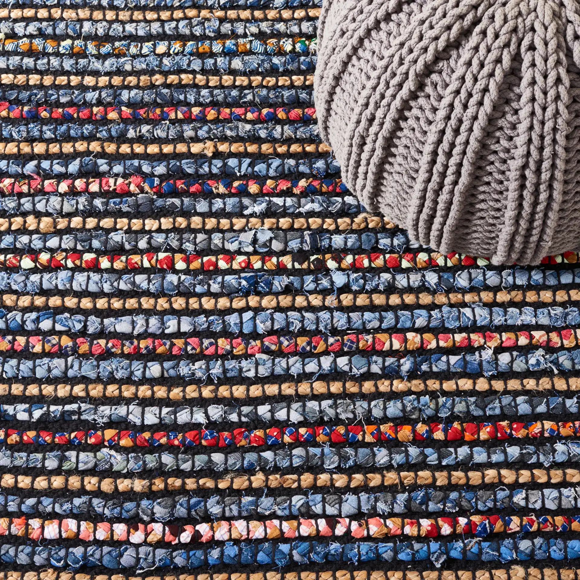 Cape Cod Allover Rag Stripe Hand-Woven Rug in Natural / Blue in a styled room