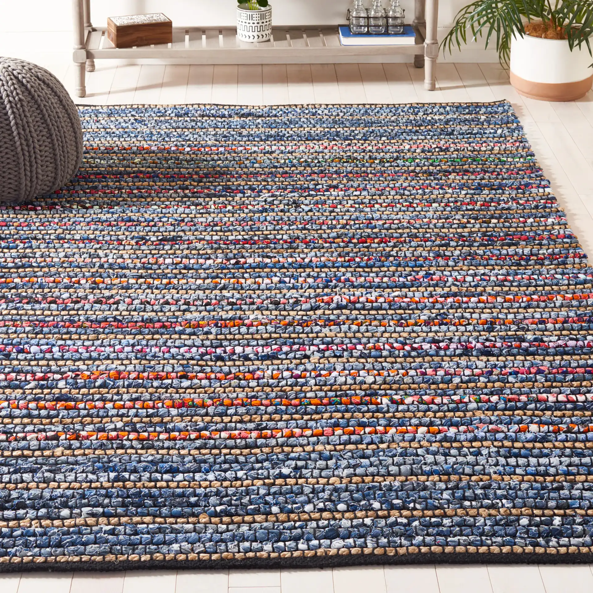 Cape Cod Allover Rag Stripe Hand-Woven Rug in Natural / Blue in a styled room