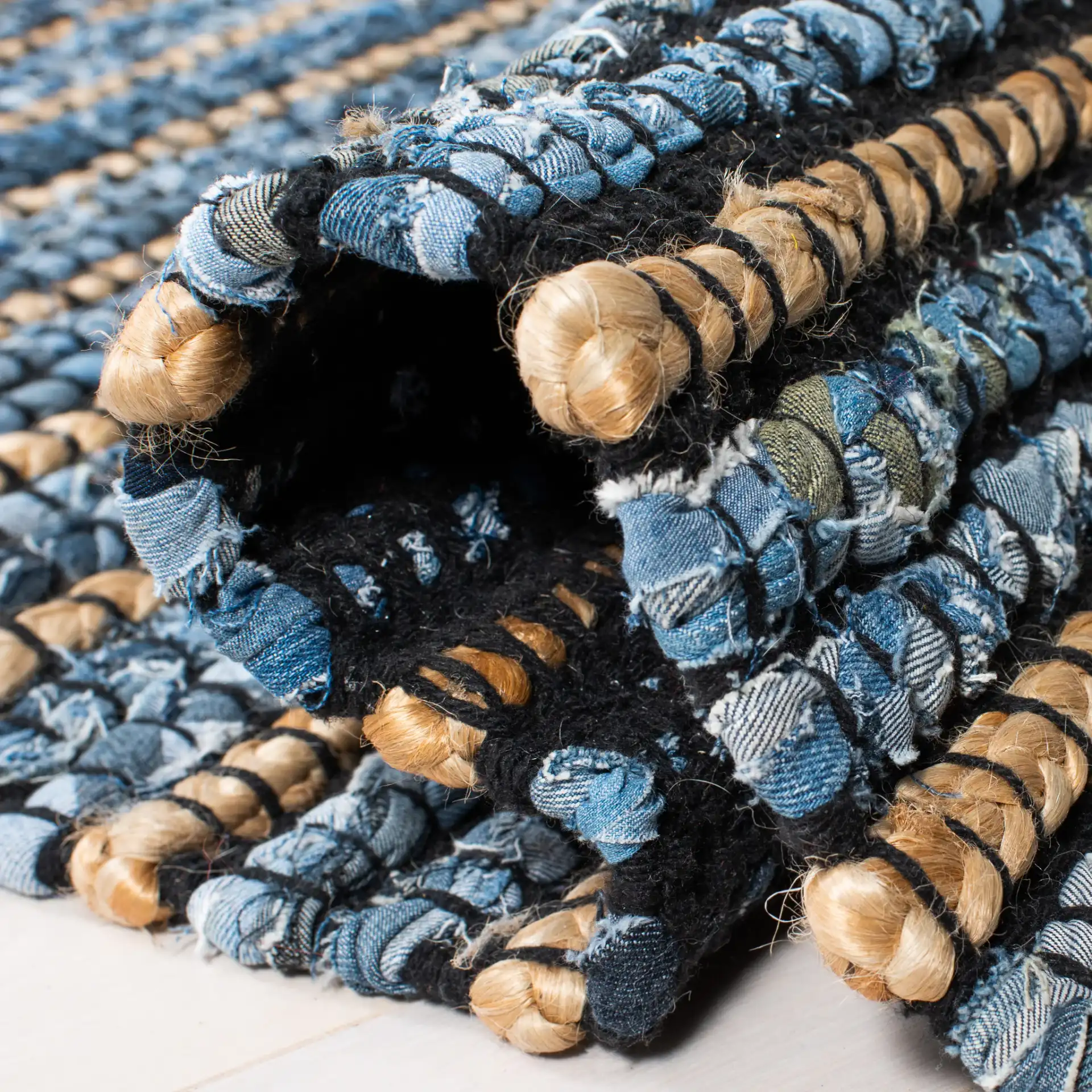 Cape Cod Beaded Stripe Hand-Woven Rug in Blue / Natural in a styled room