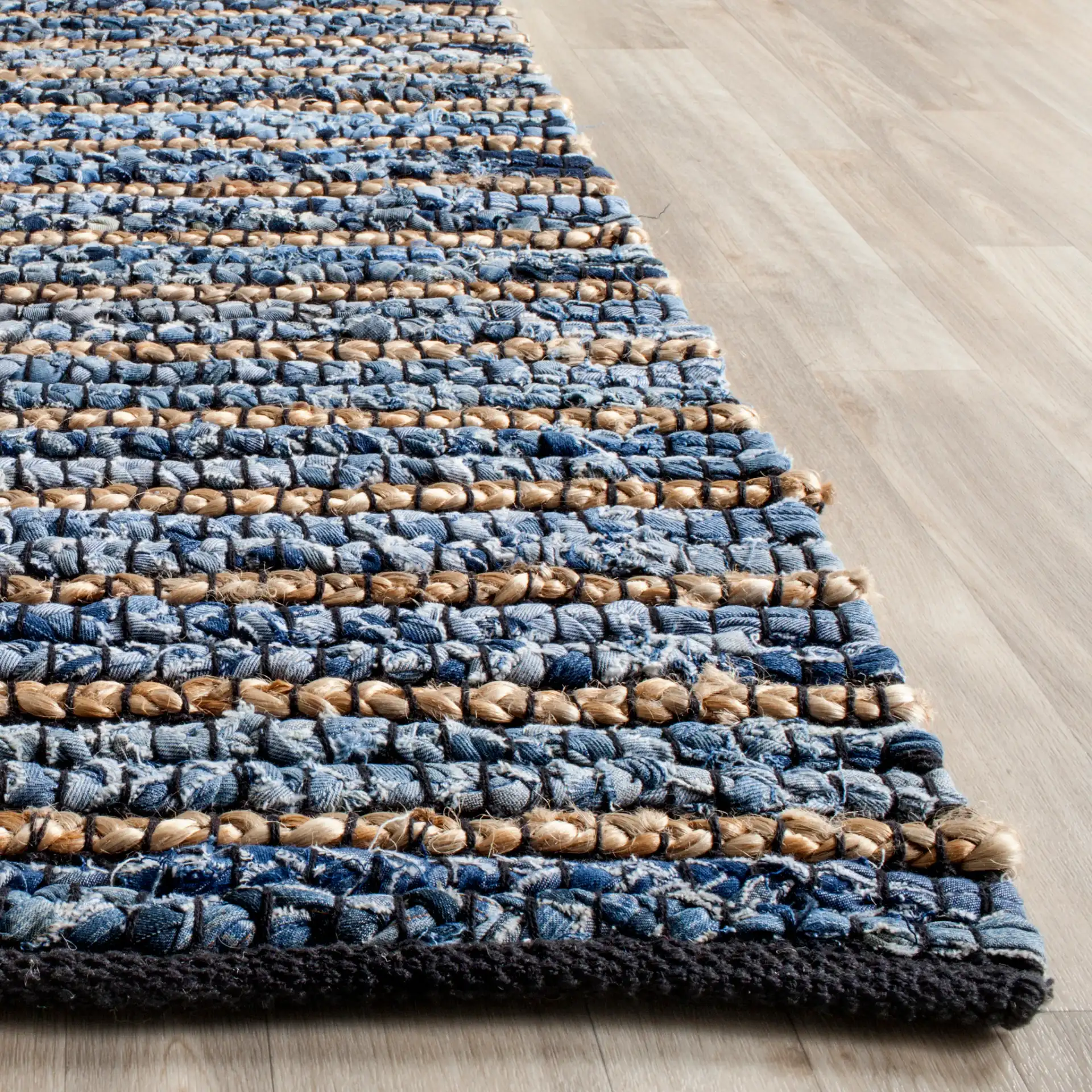 Cape Cod Beaded Stripe Hand-Woven Rug in Blue / Natural in a styled room