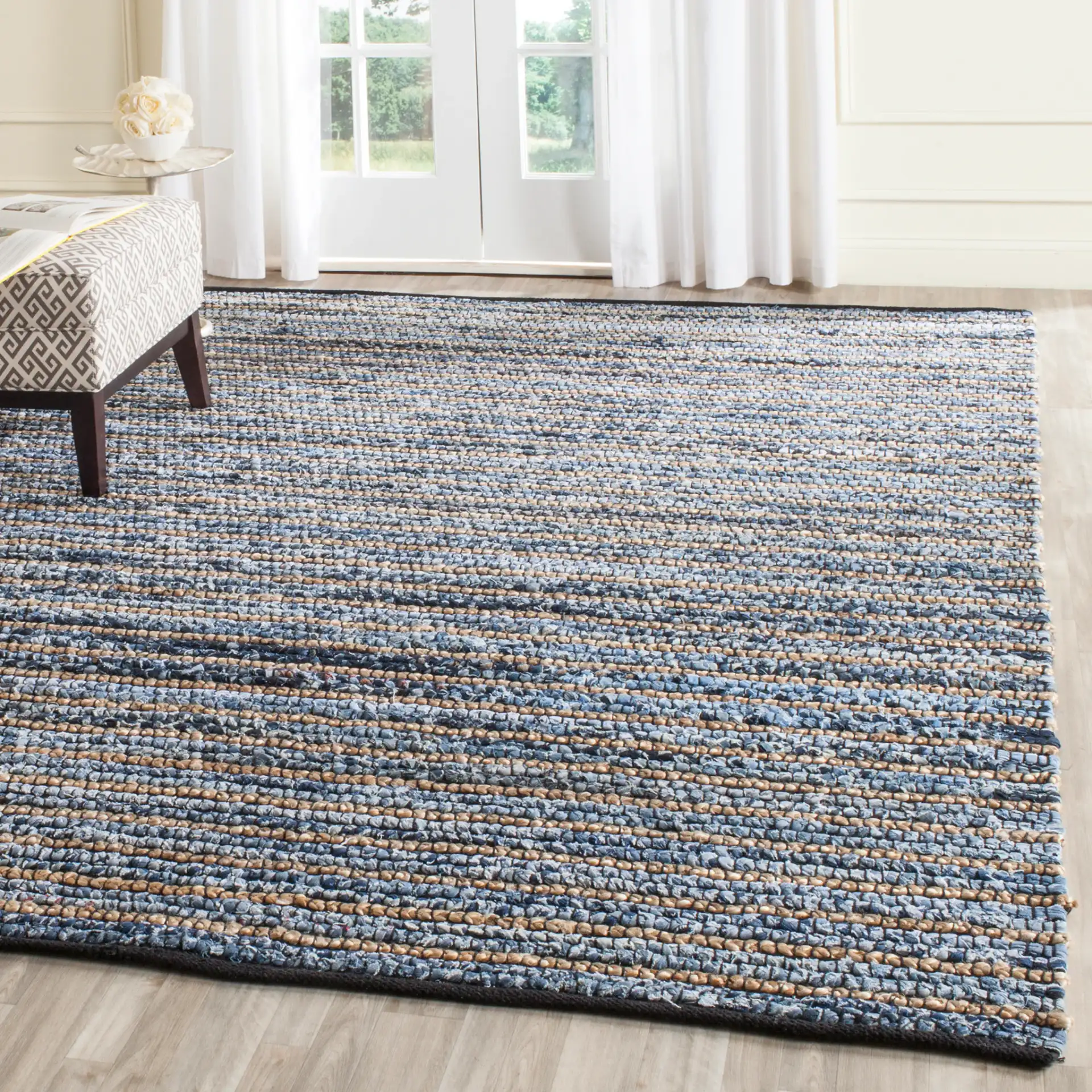 Cape Cod Beaded Stripe Hand-Woven Rug in Blue / Natural in a styled room