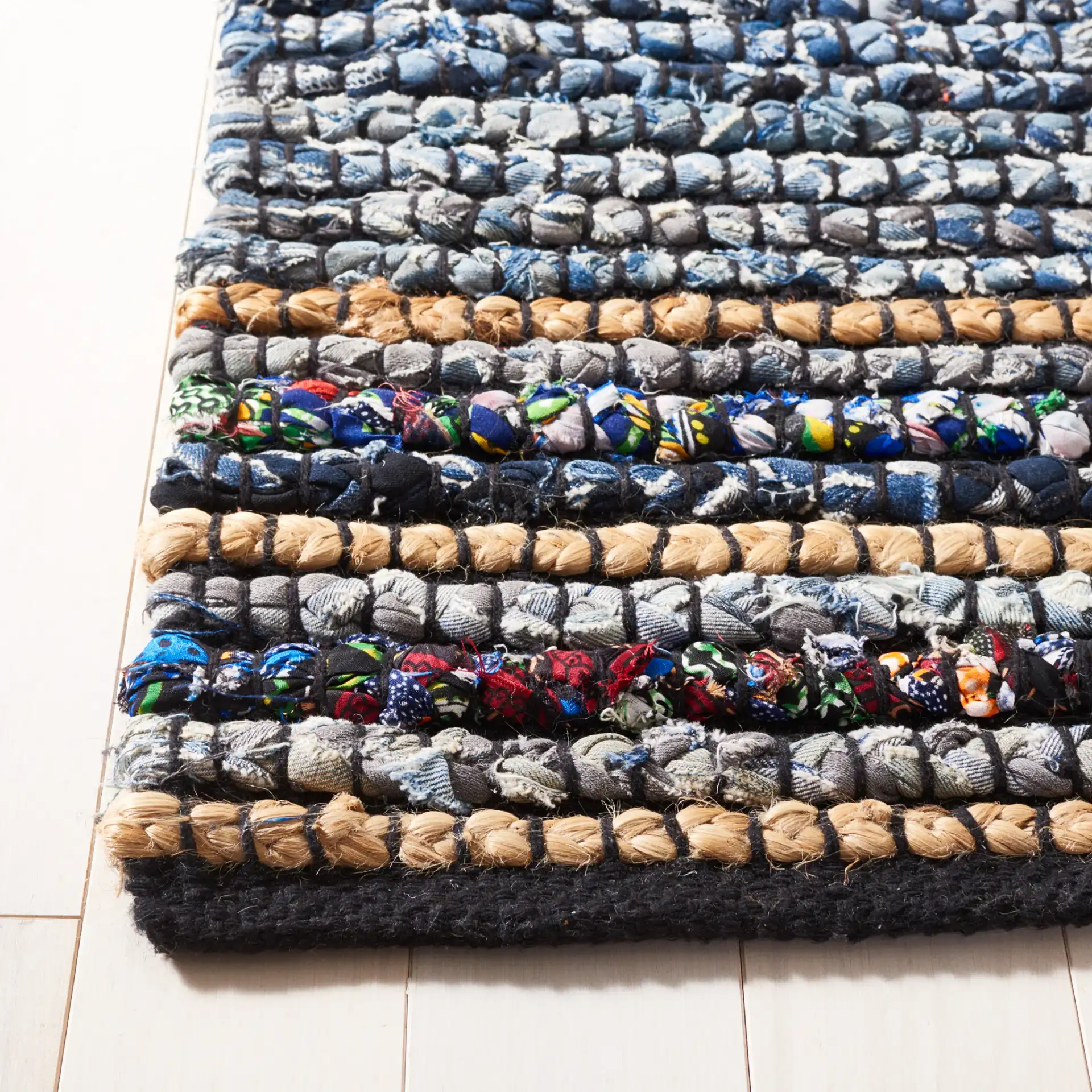 Cape Cod Dual Border Stripe Hand-Woven Rug in Natural / Blue in a styled room