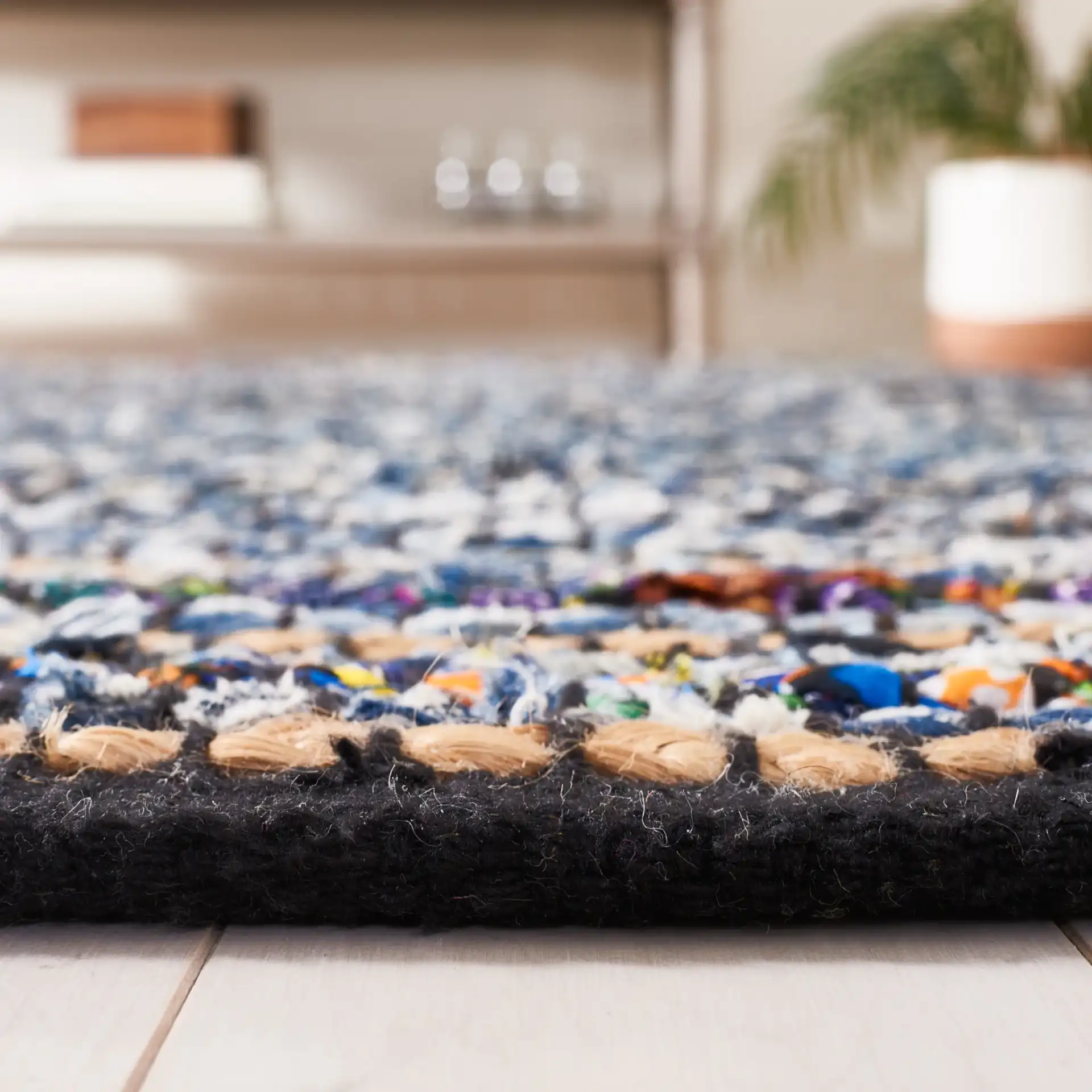 Cape Cod Dual Border Stripe Hand-Woven Rug in Natural / Blue in a styled room