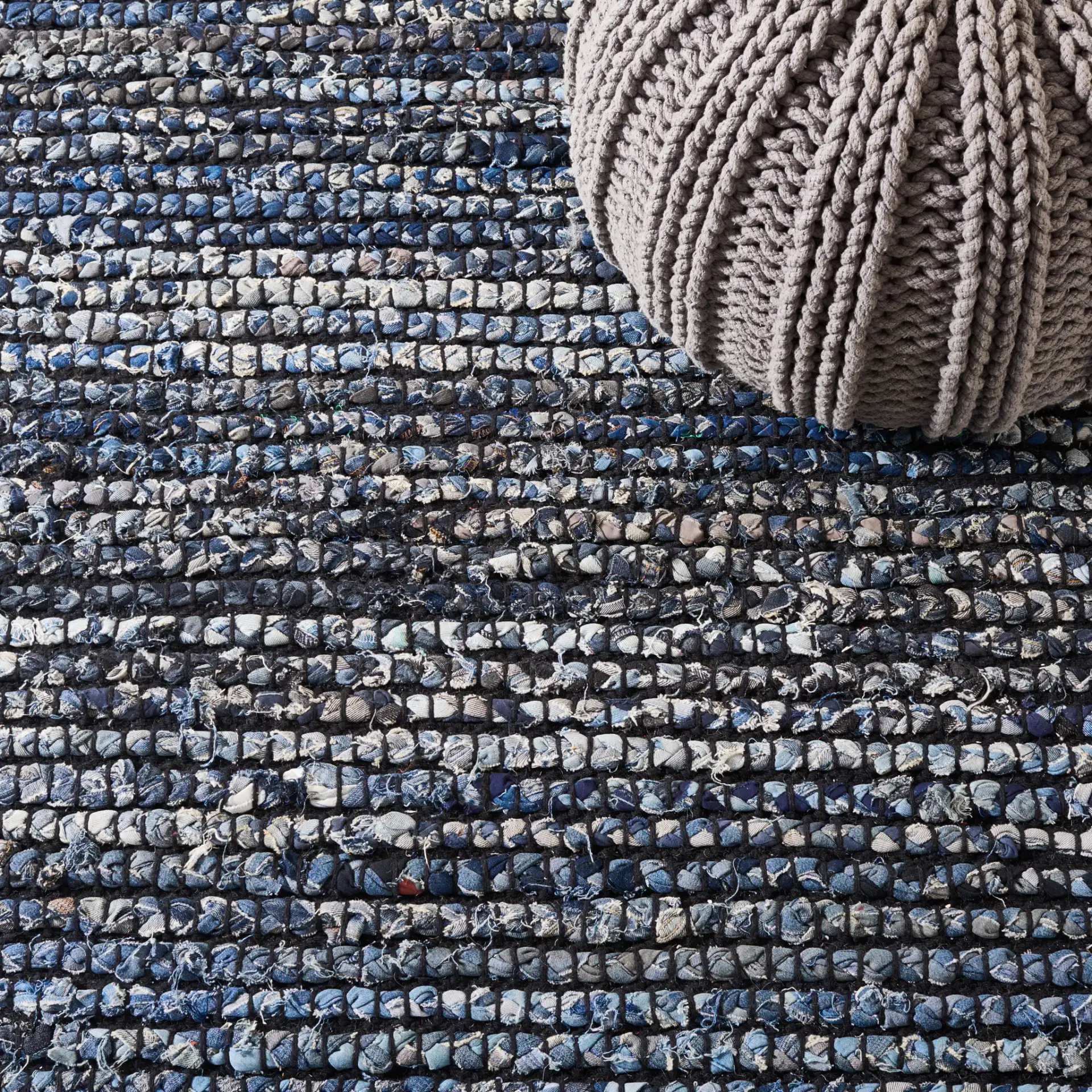 Cape Cod Dual Border Stripe Hand-Woven Rug in Natural / Blue in a styled room