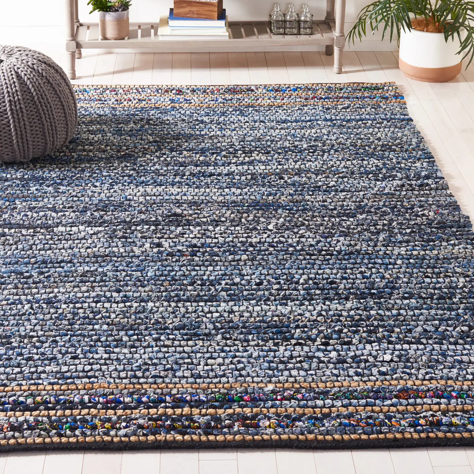 Cape Cod Dual Border Stripe Hand-Woven Rug in Natural / Blue in a styled room