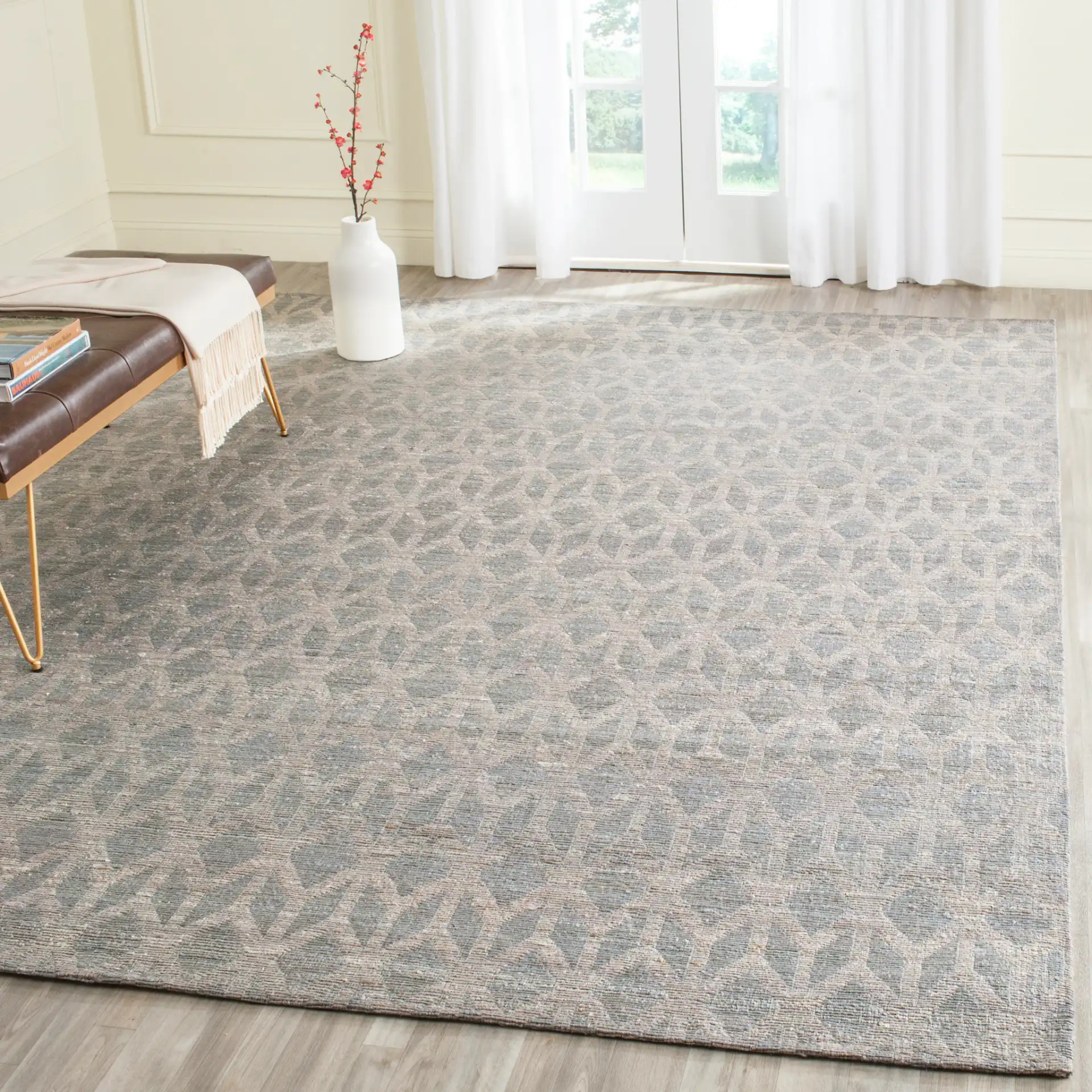 Cape Cod Diamond Hand-Woven Jute Rug in Gray / Gold in a styled room
