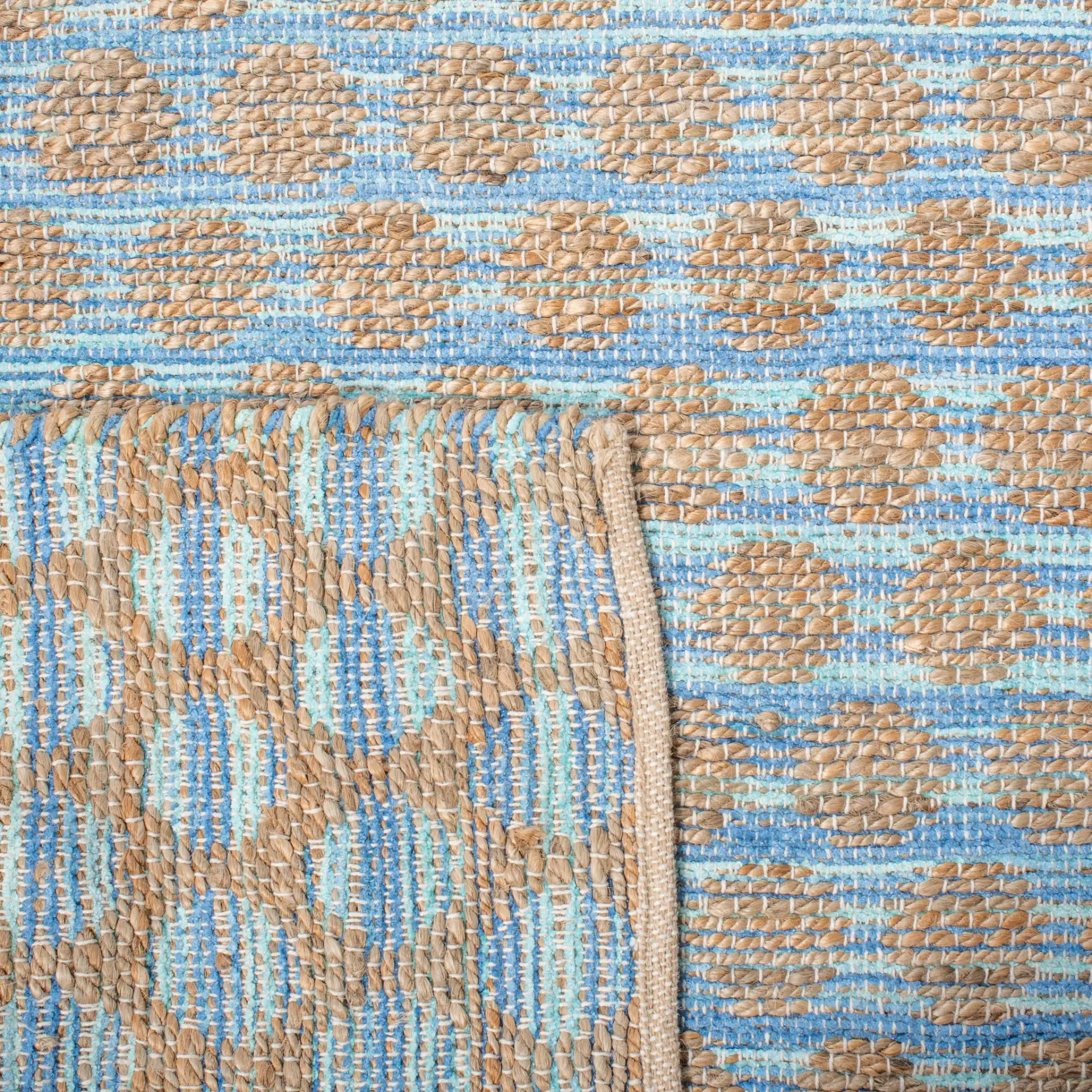 Cape Cod Dotted Stripe Hand-Woven Rug in Blue / Natural in a styled room