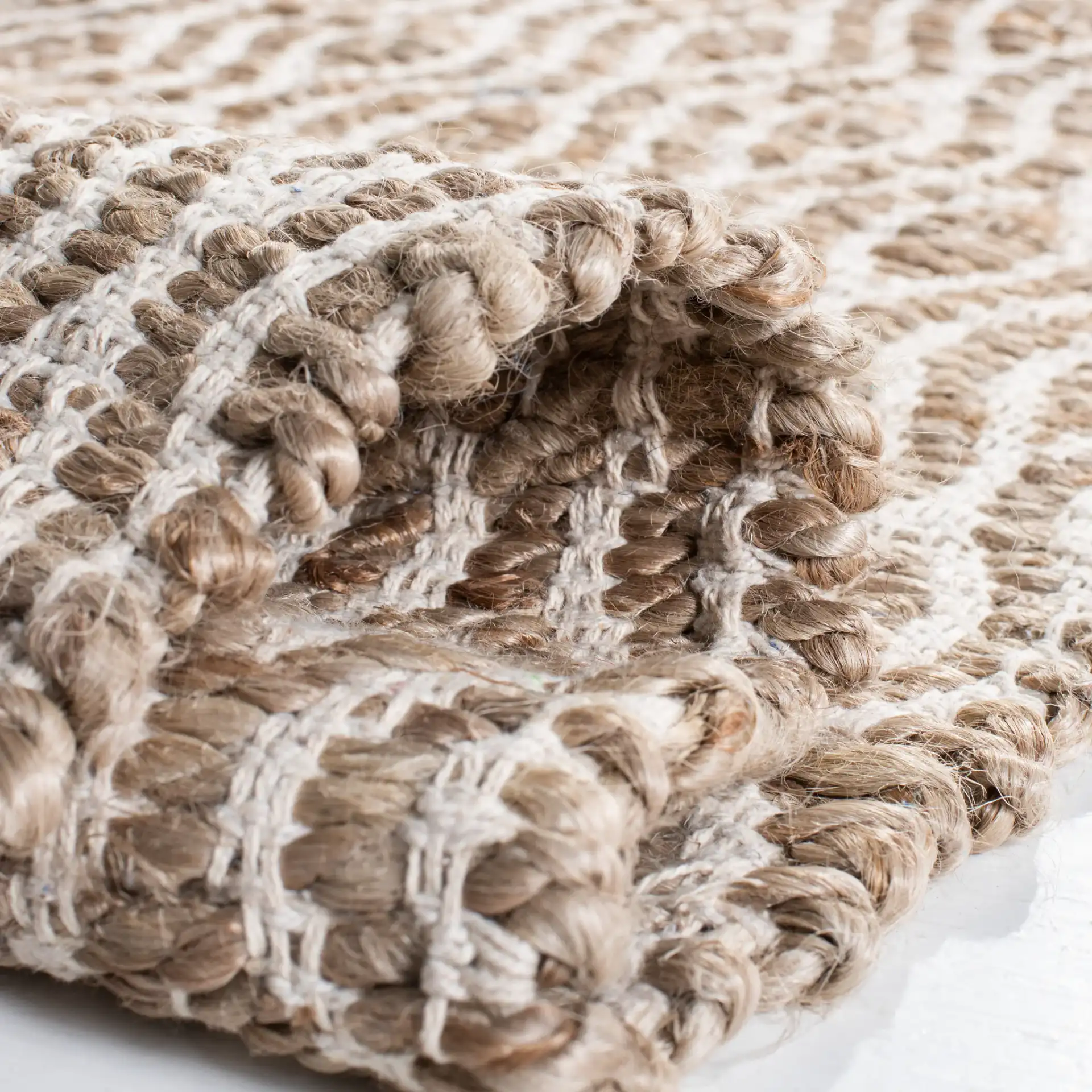 Cape Cod Hand-Woven Ogee Rug in Natural in a styled room
