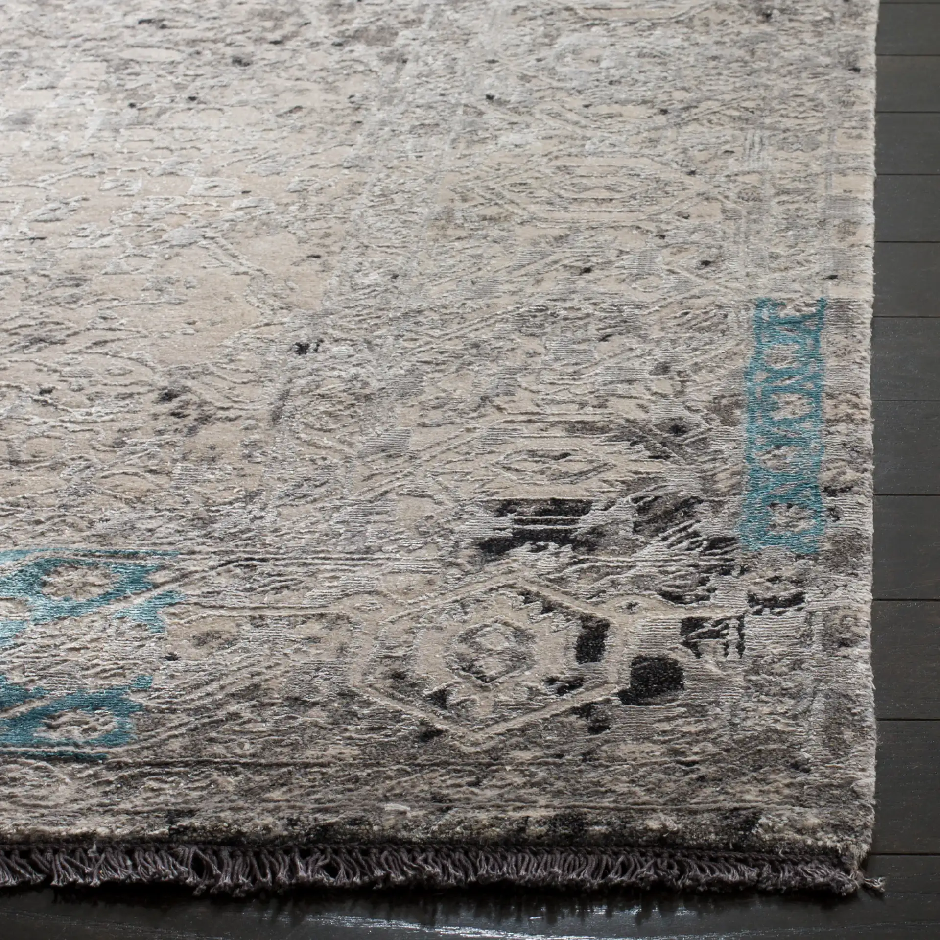 Centennial Distressed Border Hand-Knotted Rug in Light Blue in a styled room