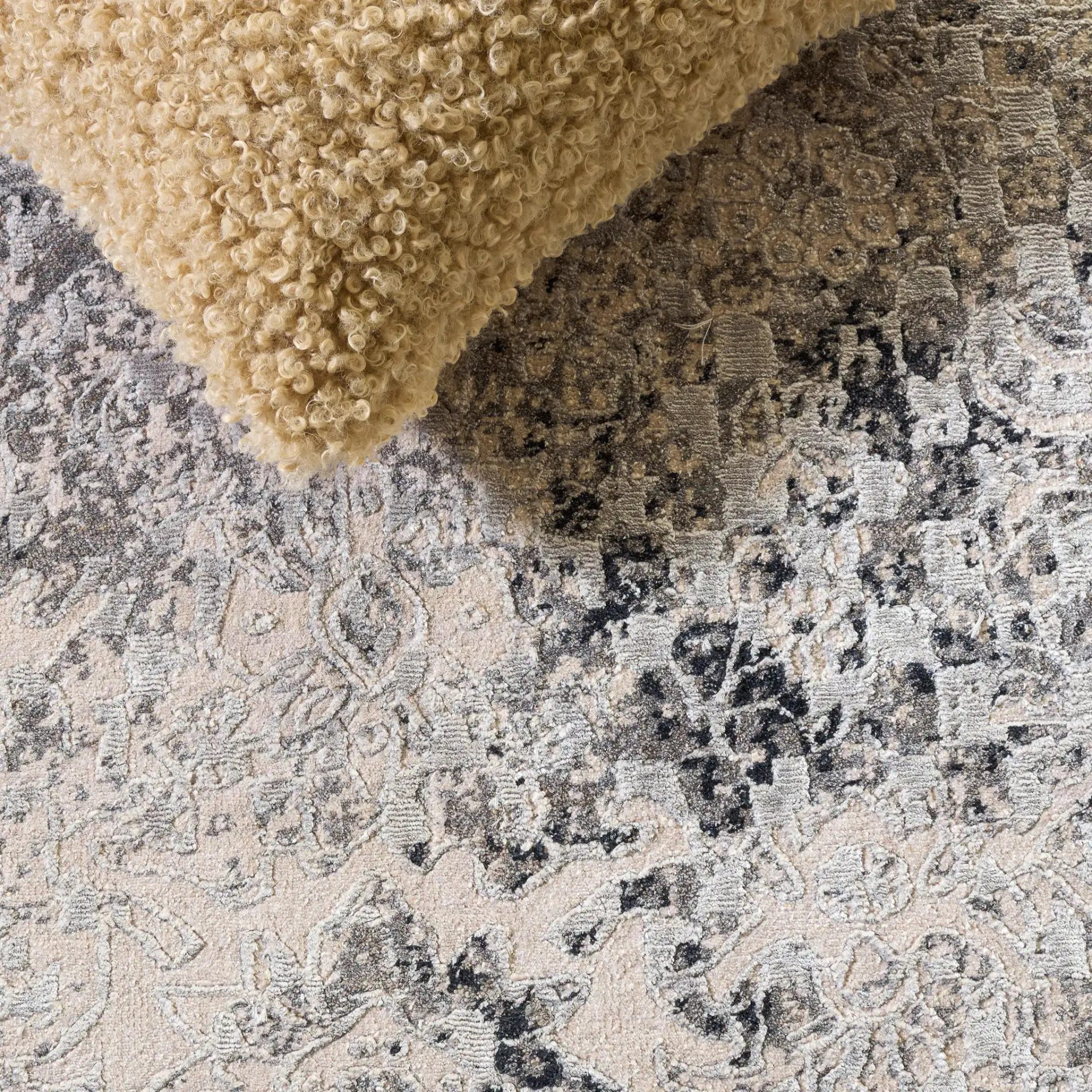 Centennial Distressed Border Hand-Knotted Rug in Light Blue in a styled room