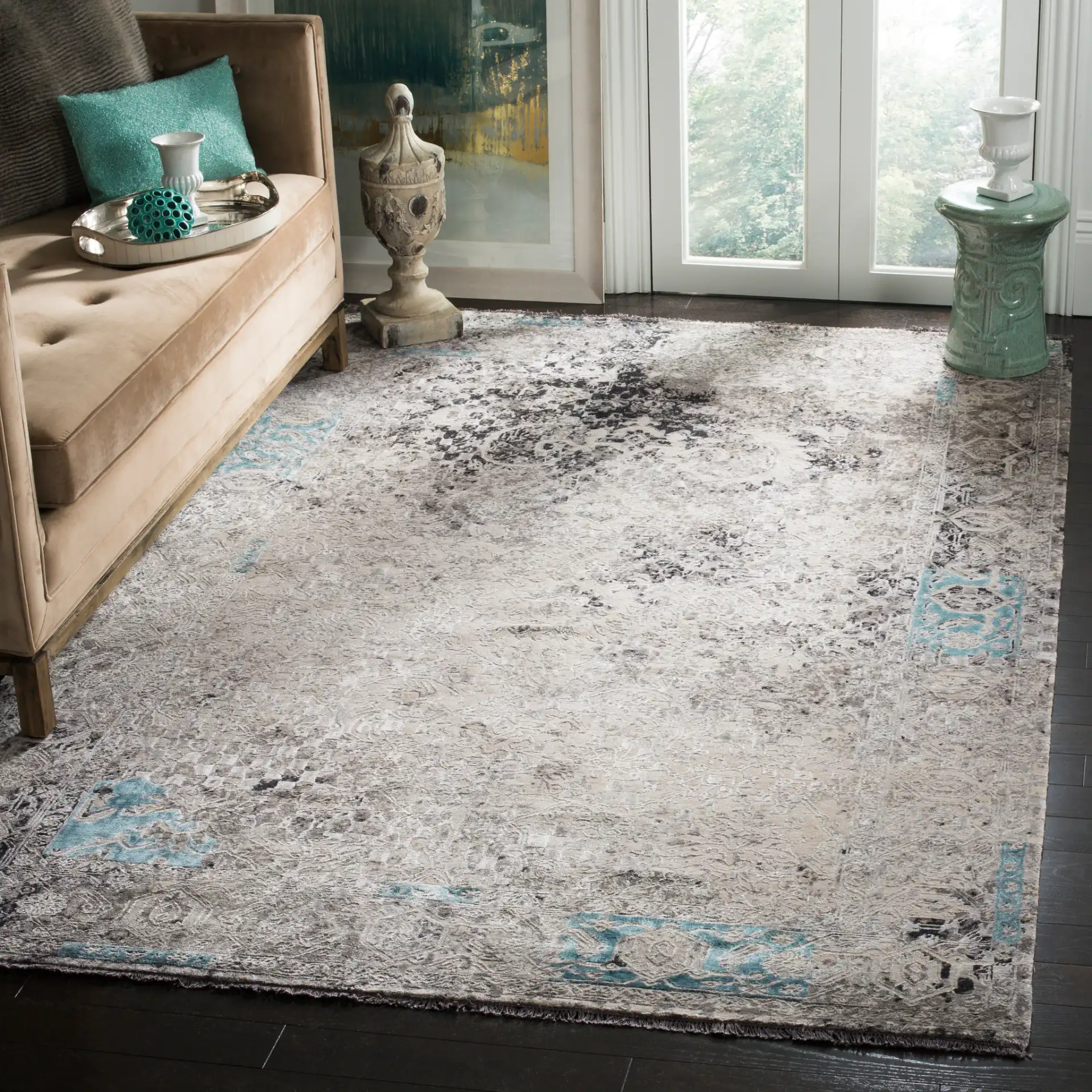 Centennial Distressed Border Hand-Knotted Rug in Light Blue in a styled room