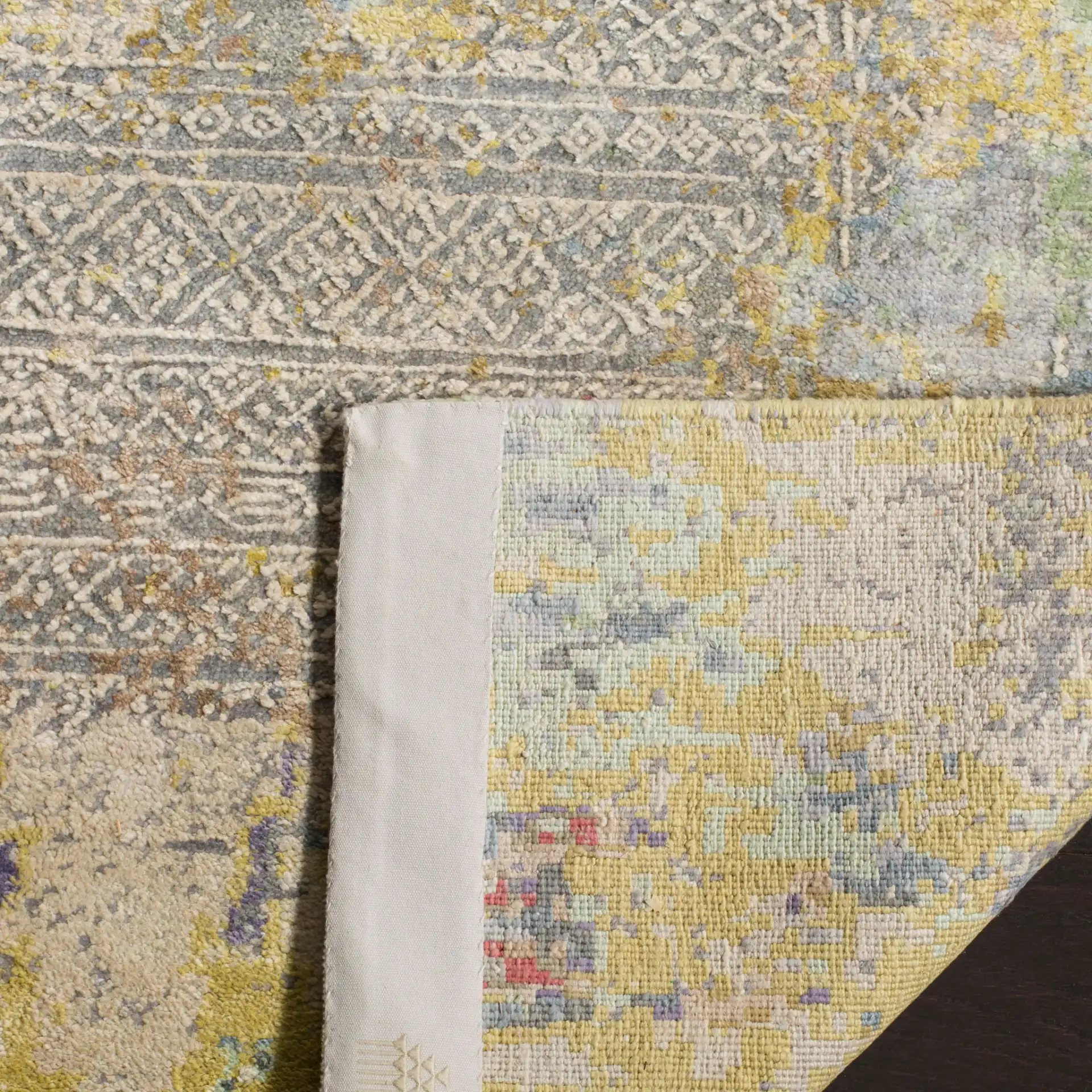 Centennial Distressed Banded Hand-Knotted Rug in Multicolor in a styled room