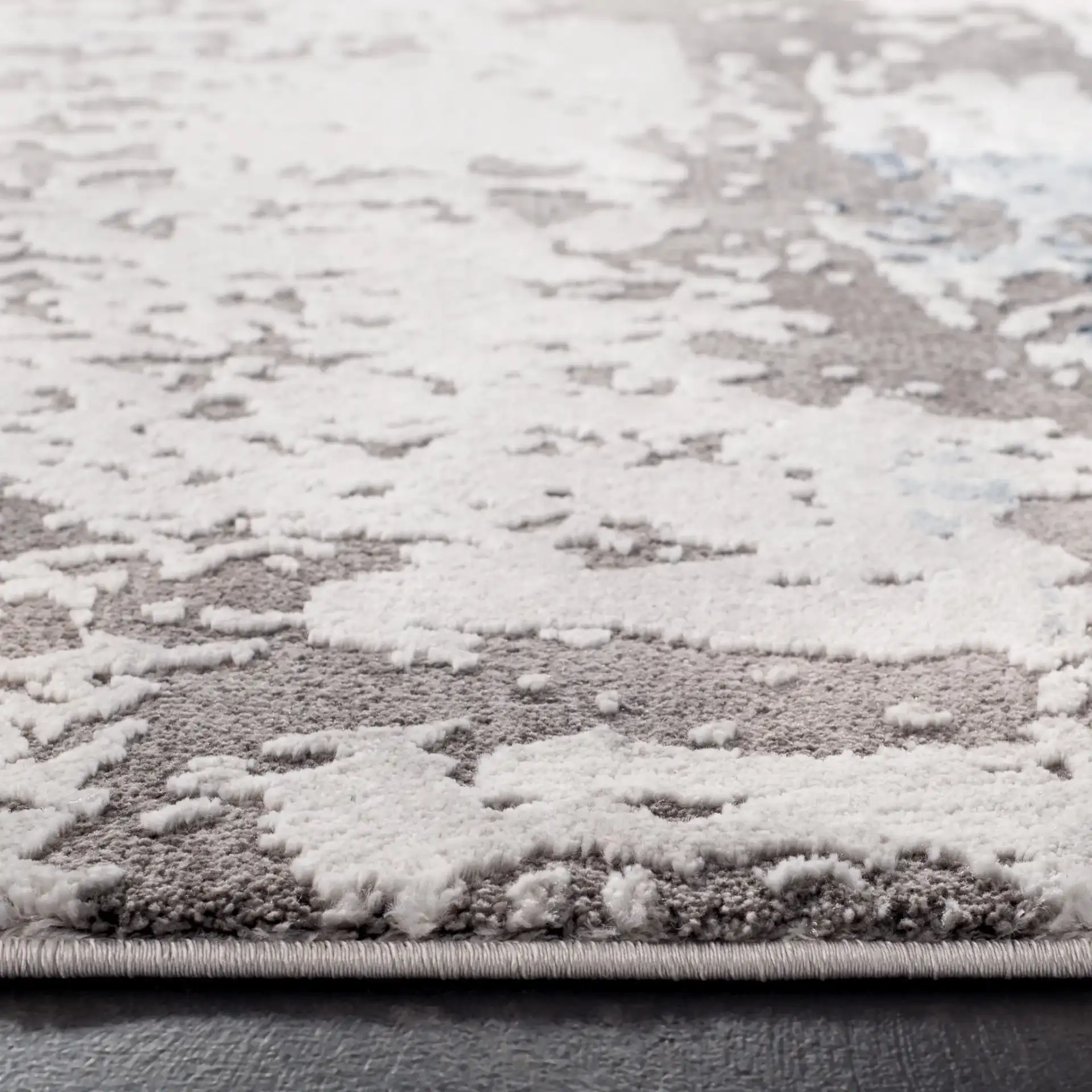 Craft Painterly Abstract Rug in Gray / Blue in a styled room