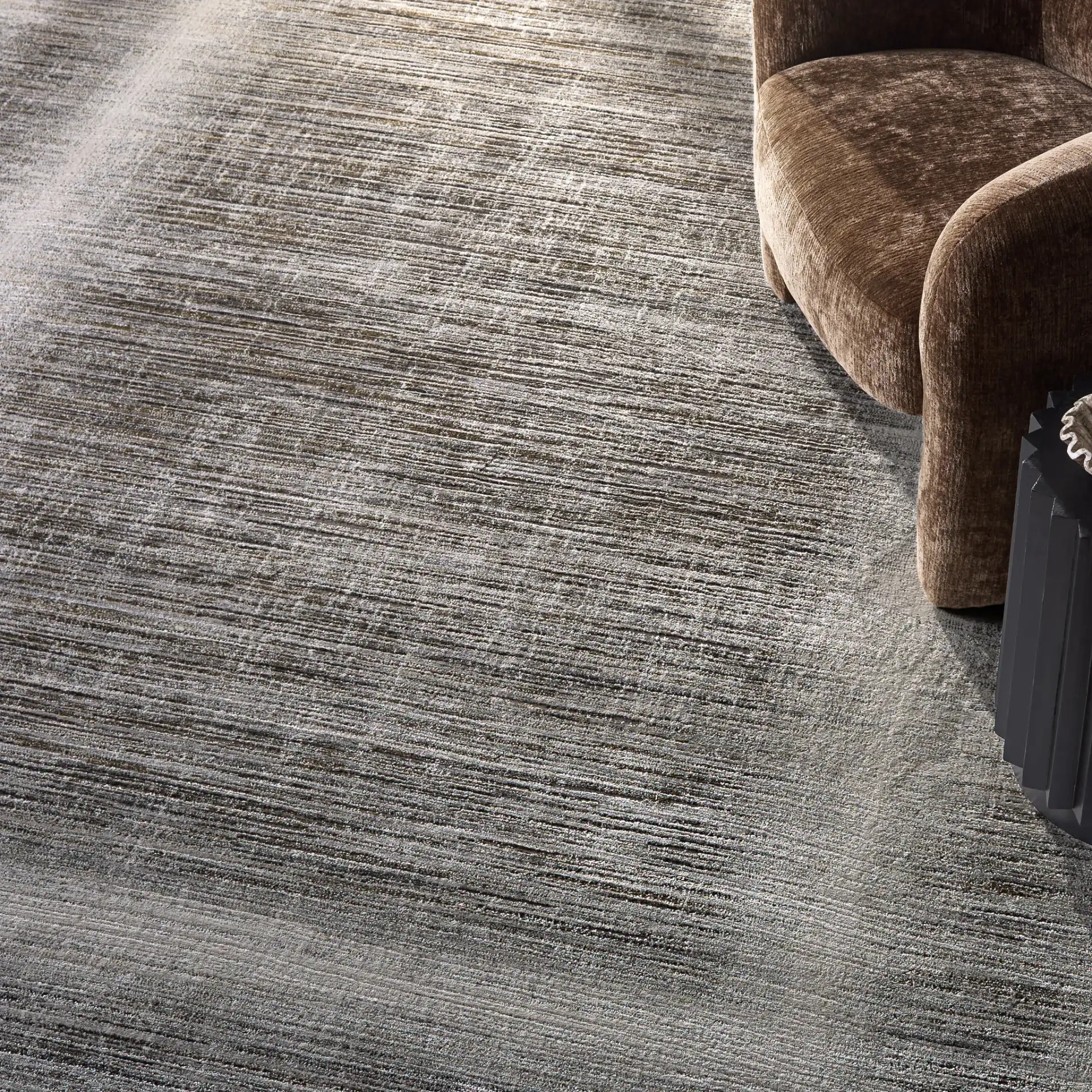 Craft Linear Abstract Border Rug in Gray / Gold in a styled room