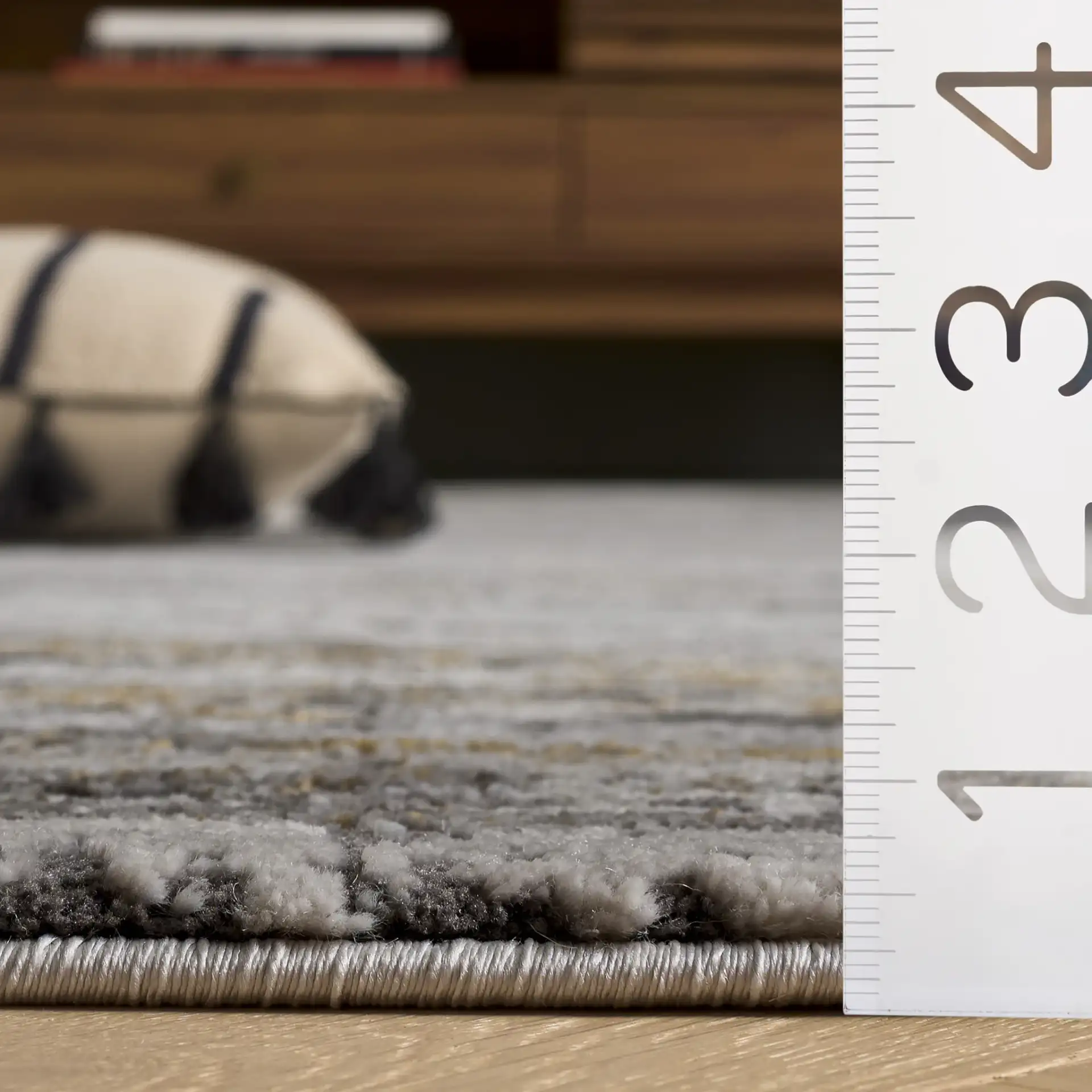 Craft Modern Abstract Rug in Gray / Gold in a styled room