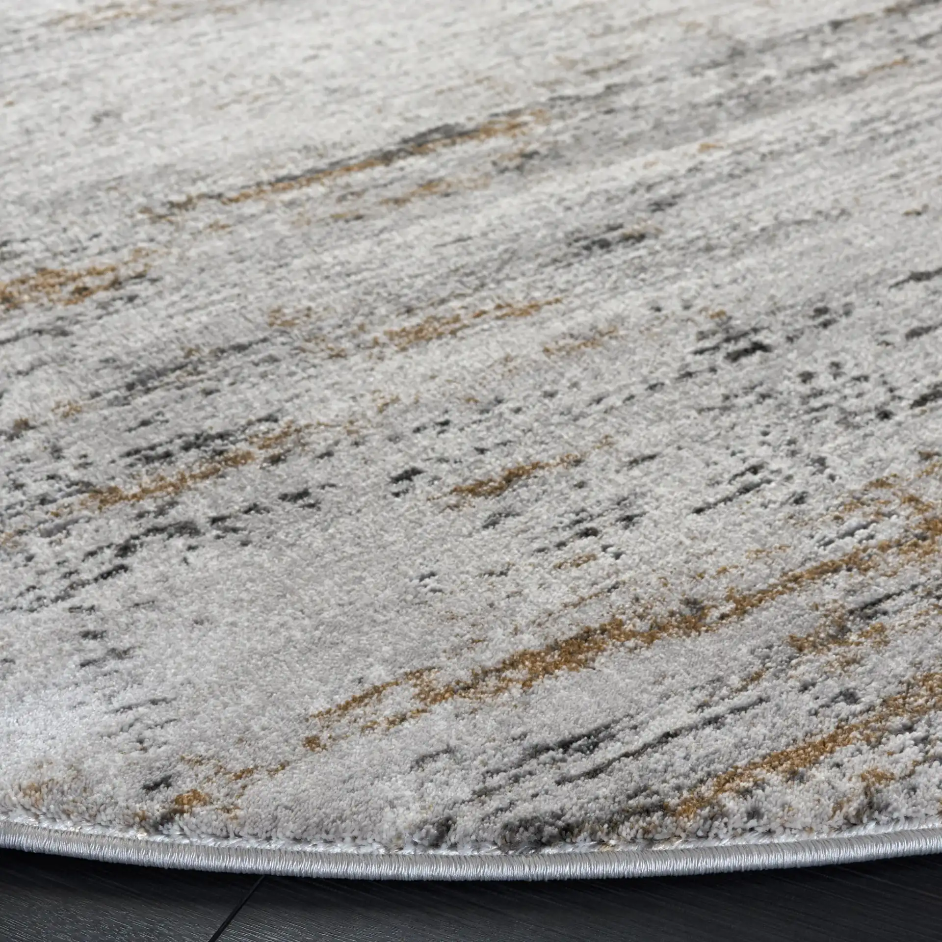 Craft Modern Abstract Rug in Gray / Gold in a styled room