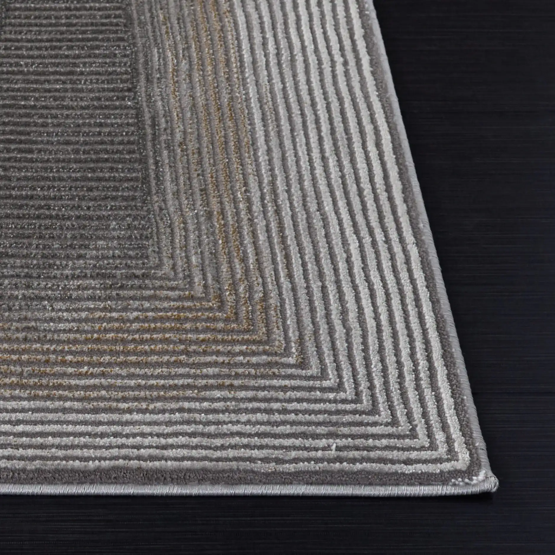 Craft Linear Arch Rug in Gray / Gold in a styled room