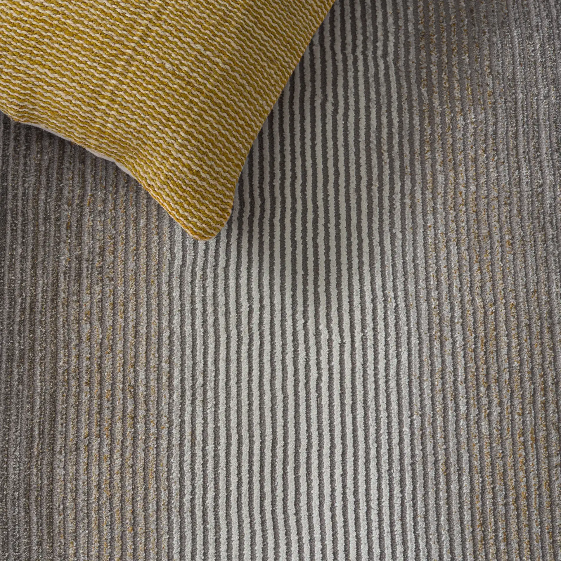 Craft Linear Arch Rug in Gray / Gold in a styled room