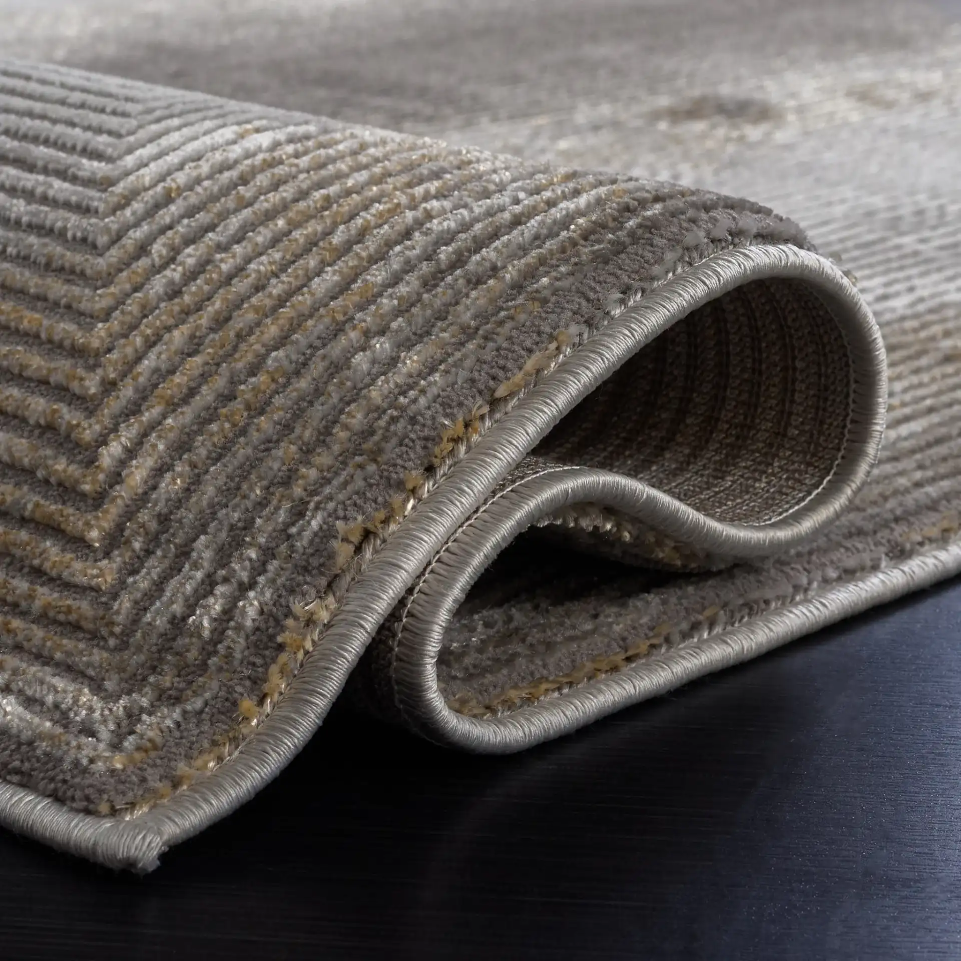Craft Linear Arch Rug in Gray / Gold in a styled room