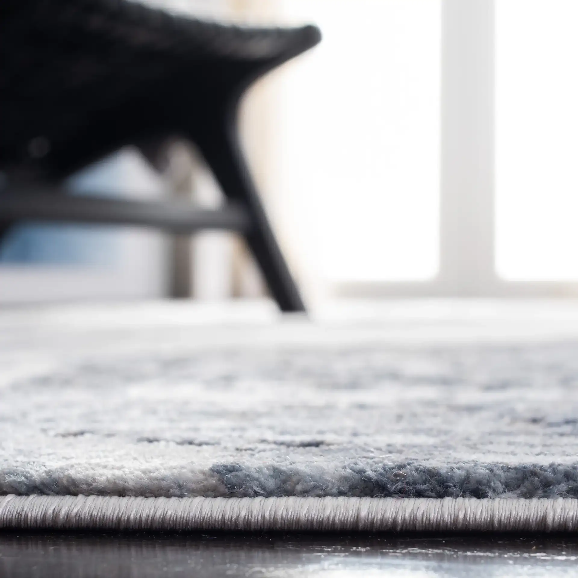 Craft Marbled Stone Rug in Blue / Gray in a styled room