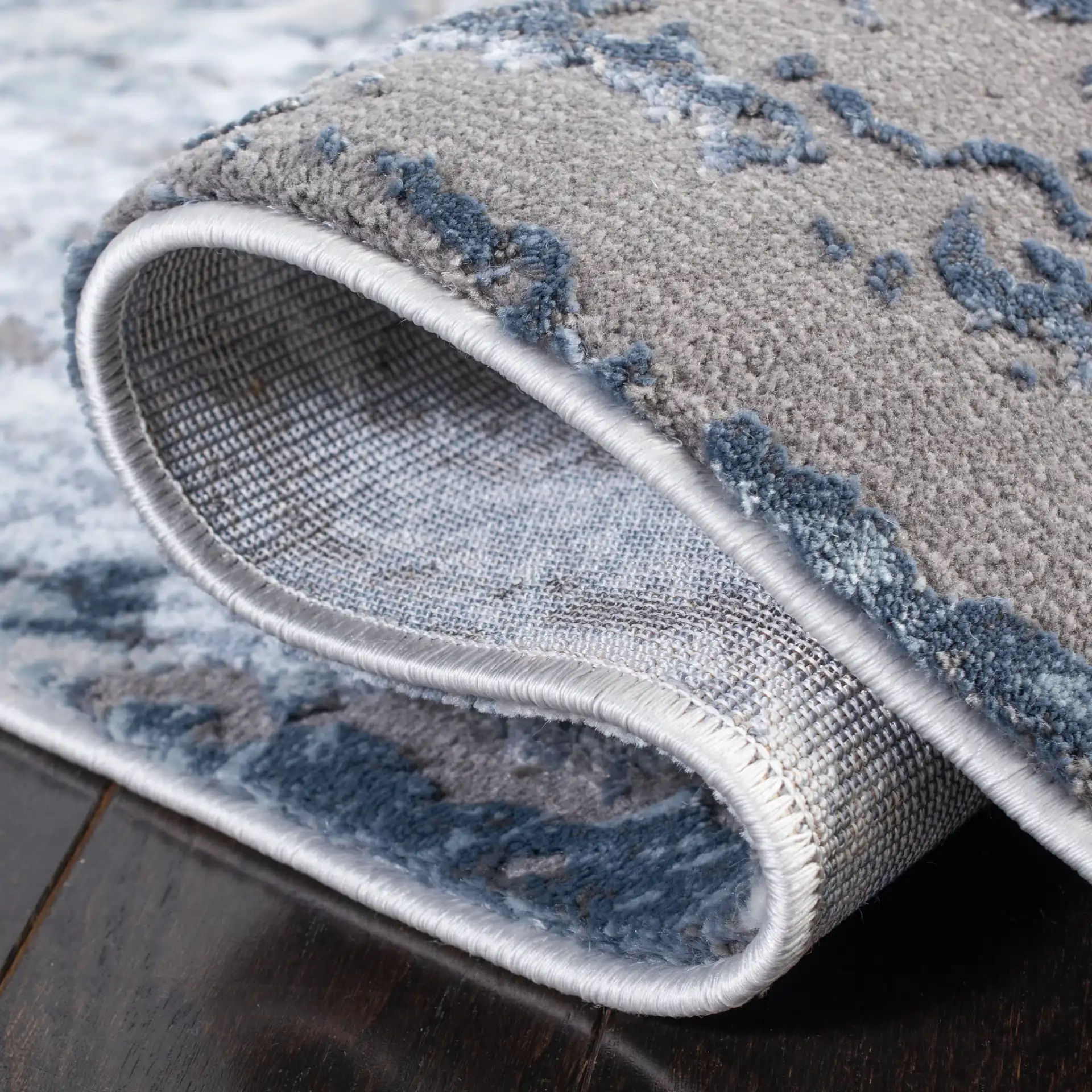 Craft Marbled Stone Rug in Blue / Gray in a styled room