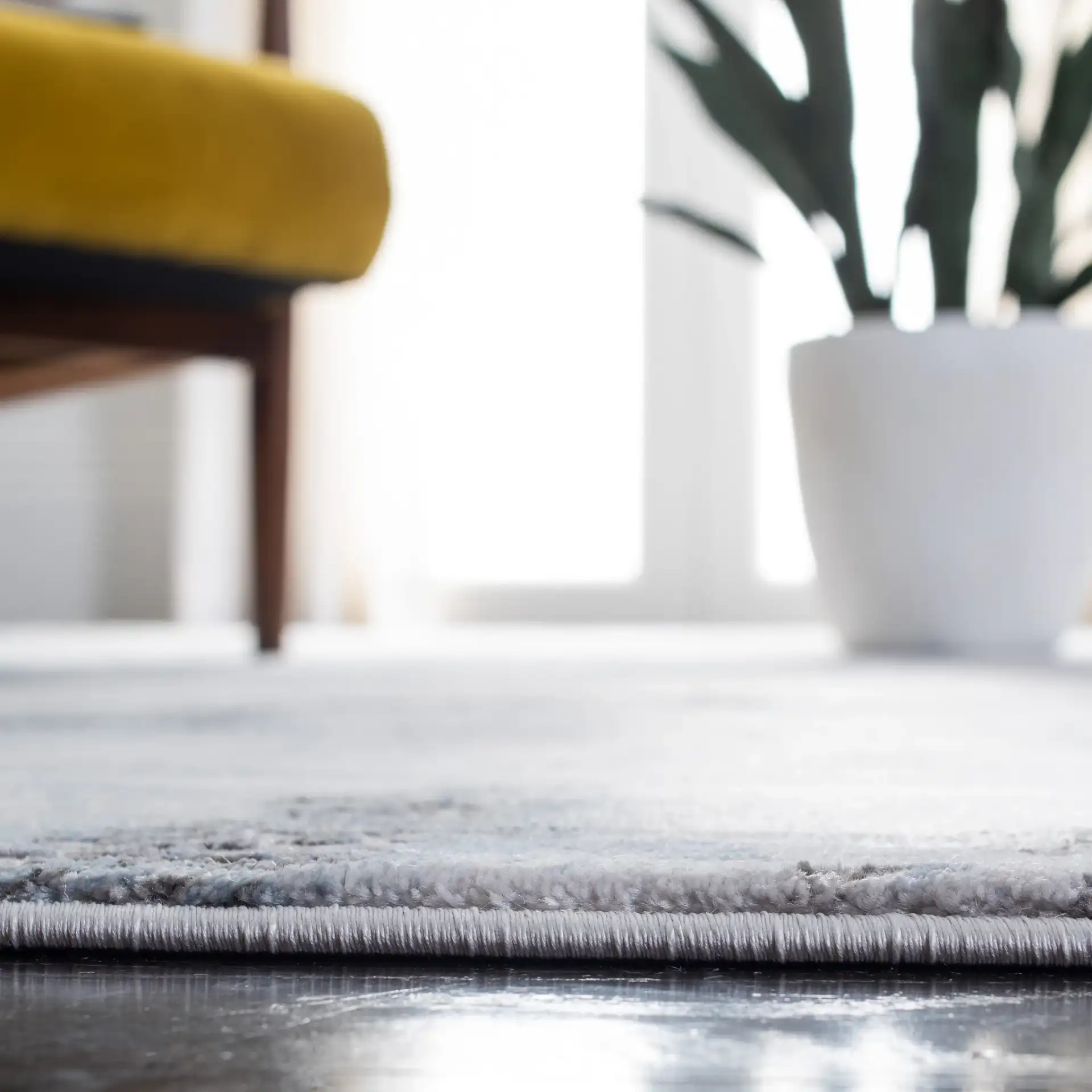 Craft Abstract Rug in Blue / Gray in a styled room