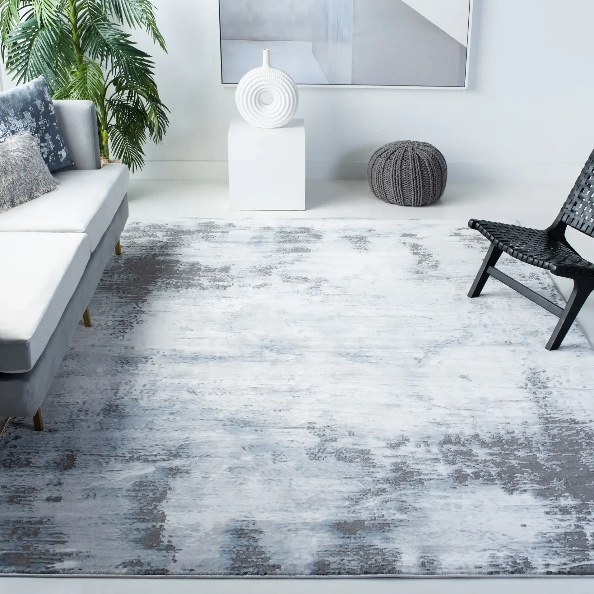 Craft Abstract Rug in Blue / Gray in a styled room