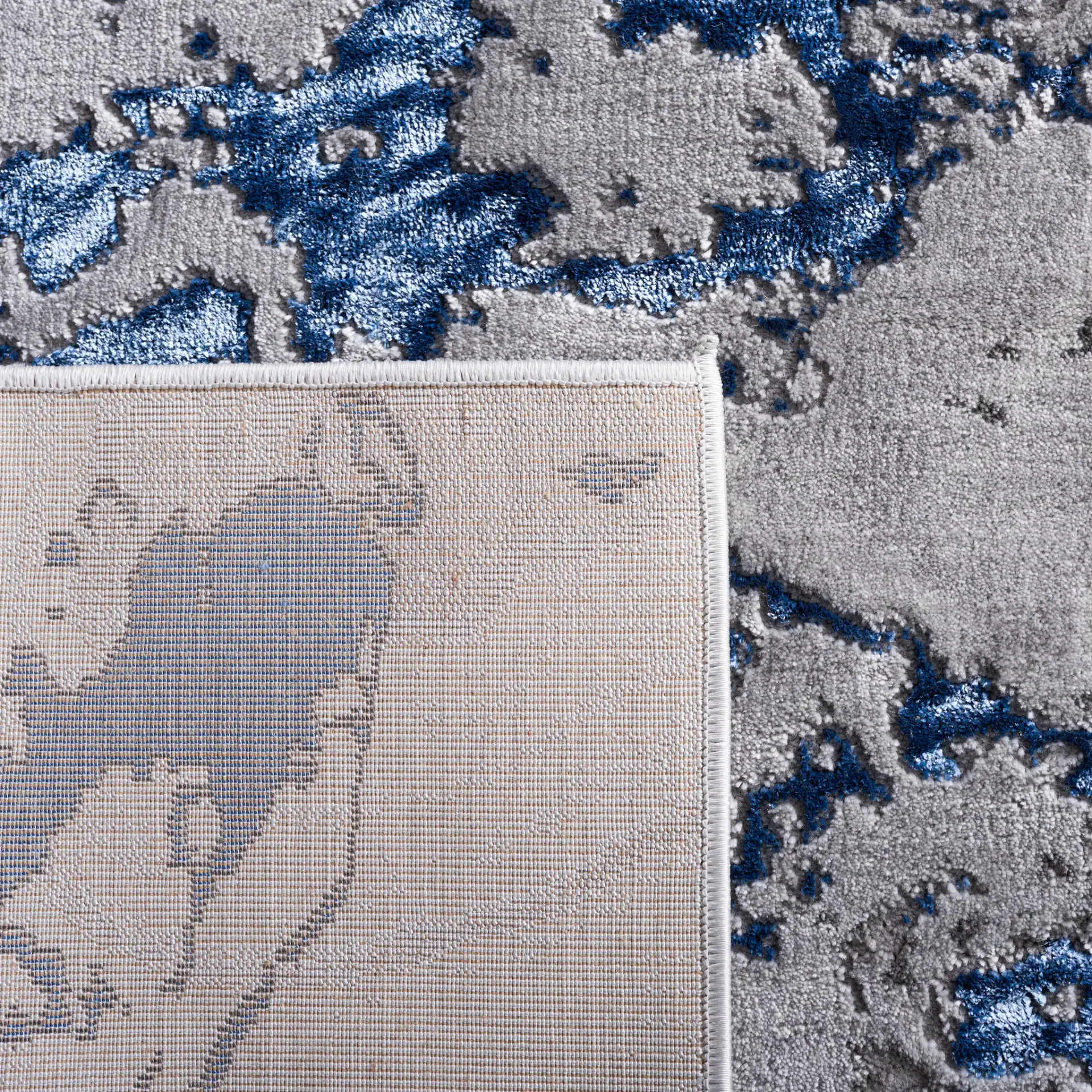 Craft Abstract Marble Rug in Gray / Blue in a styled room