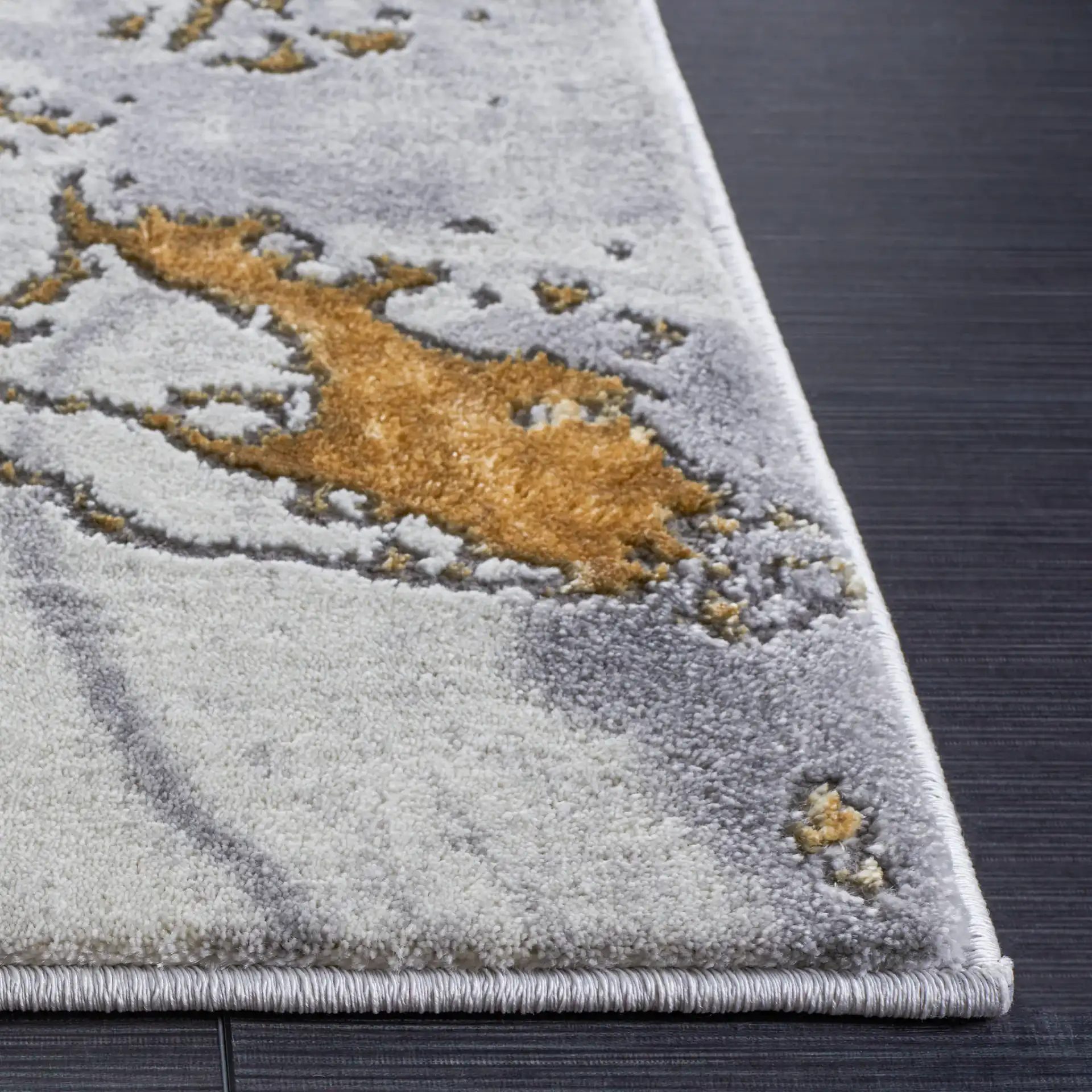 Craft Agate Marble Rug in Gray / Gold in a styled room