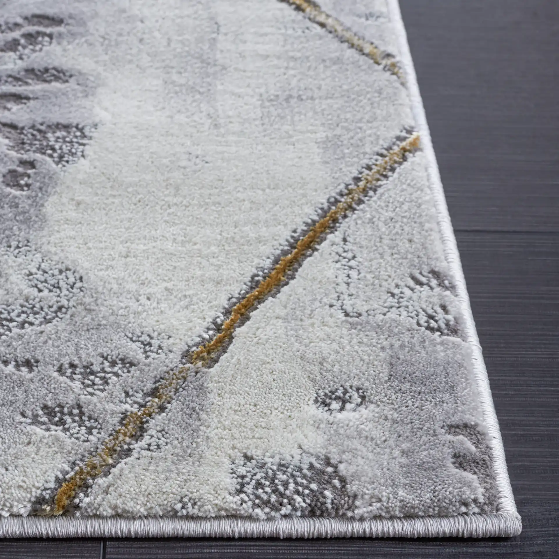 Craft Diamond Grid Rug in Gray / Gold in a styled room