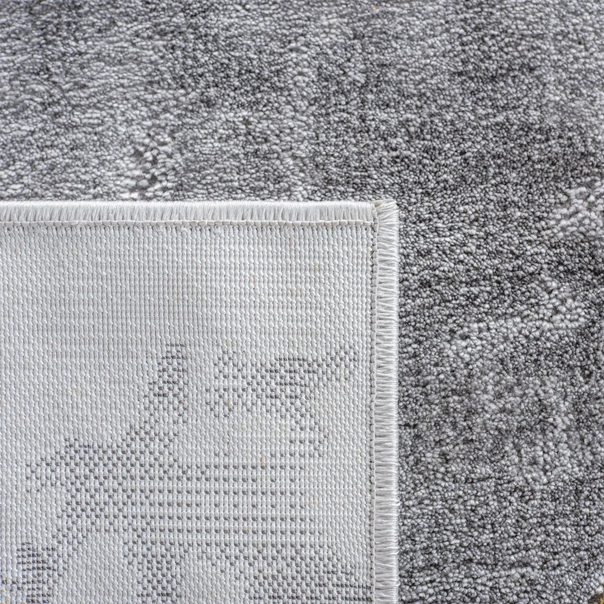 Craft Diamond Grid Rug in Gray / Gold in a styled room
