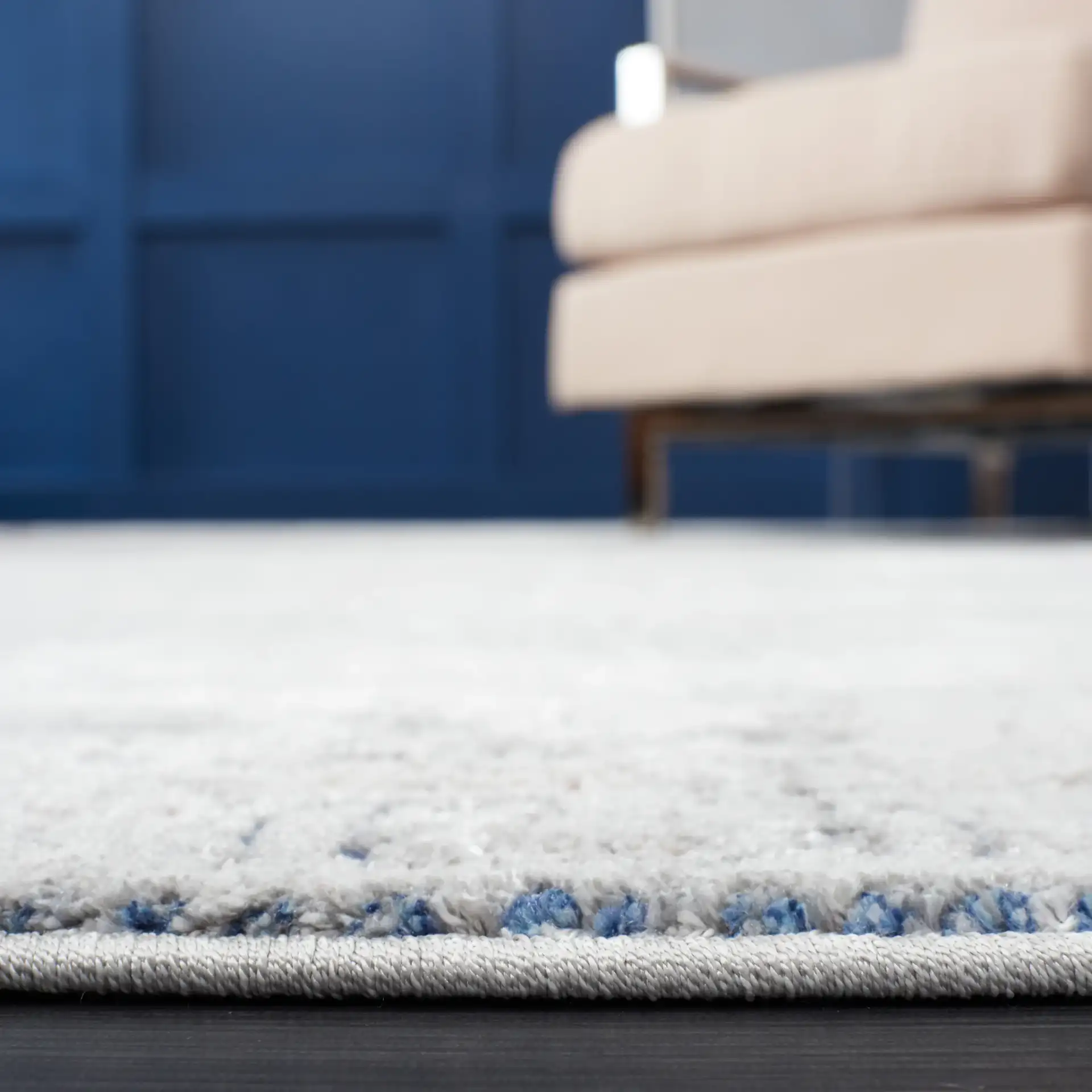 Craft Bordered Medallion Rug in Gray / Blue in a styled room