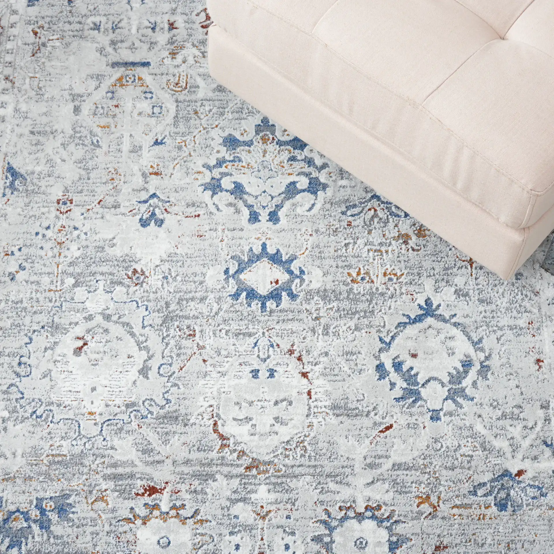 Craft Bordered Medallion Rug in Gray / Blue in a styled room