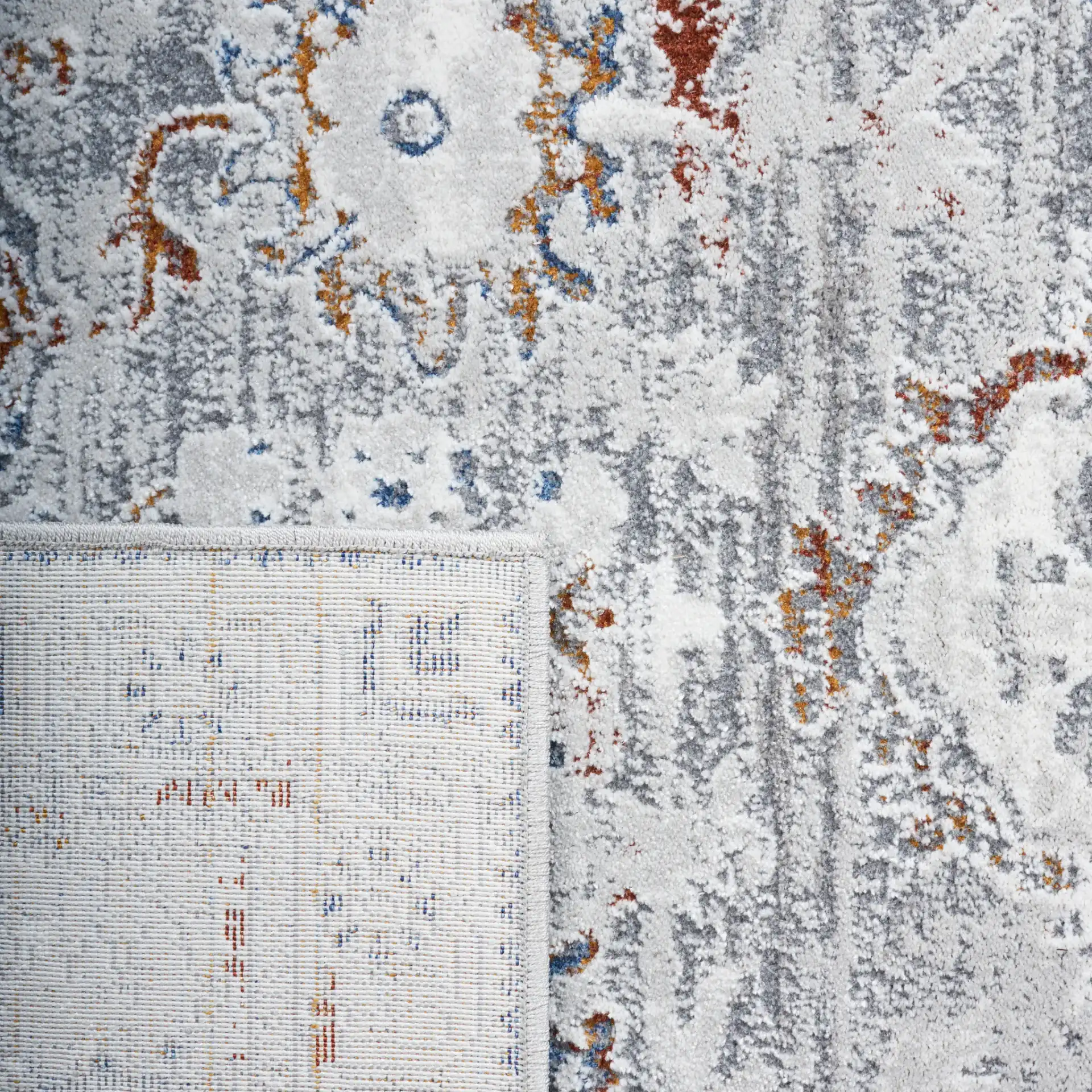 Craft Bordered Medallion Rug in Gray / Blue in a styled room