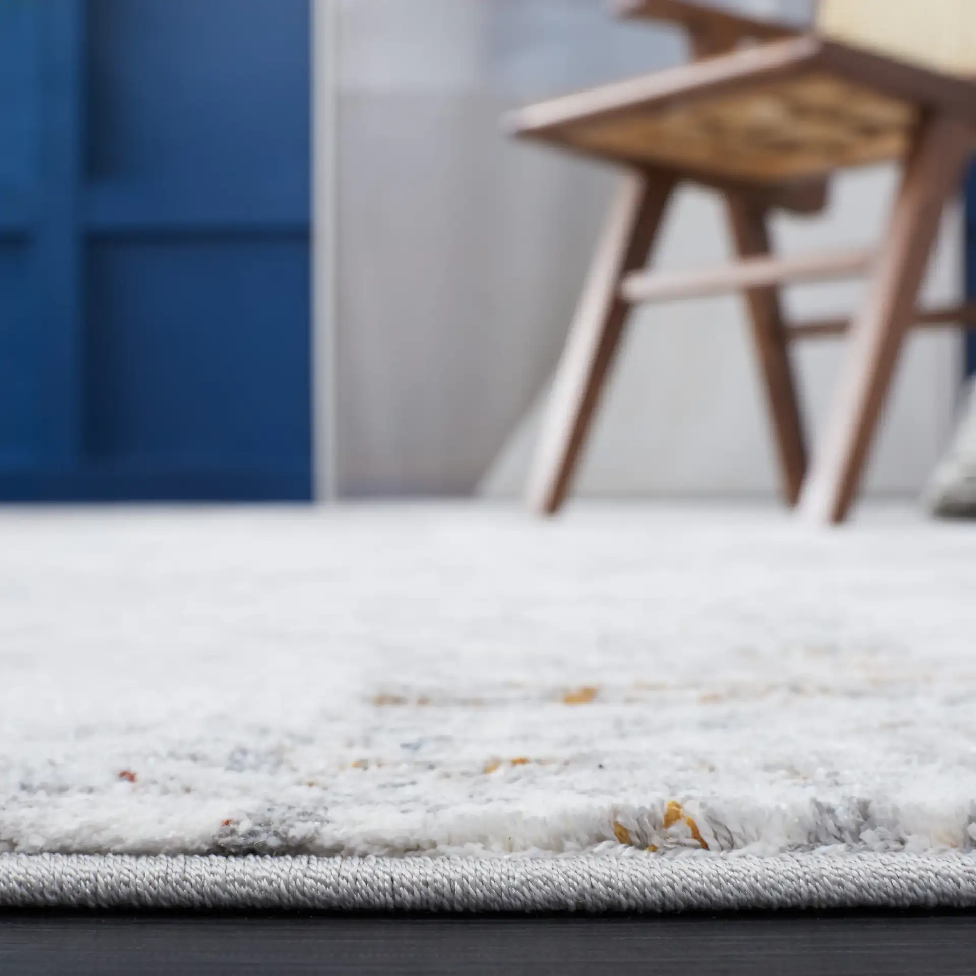 Craft Distressed Abstract Rug in Gray / Gold in a styled room