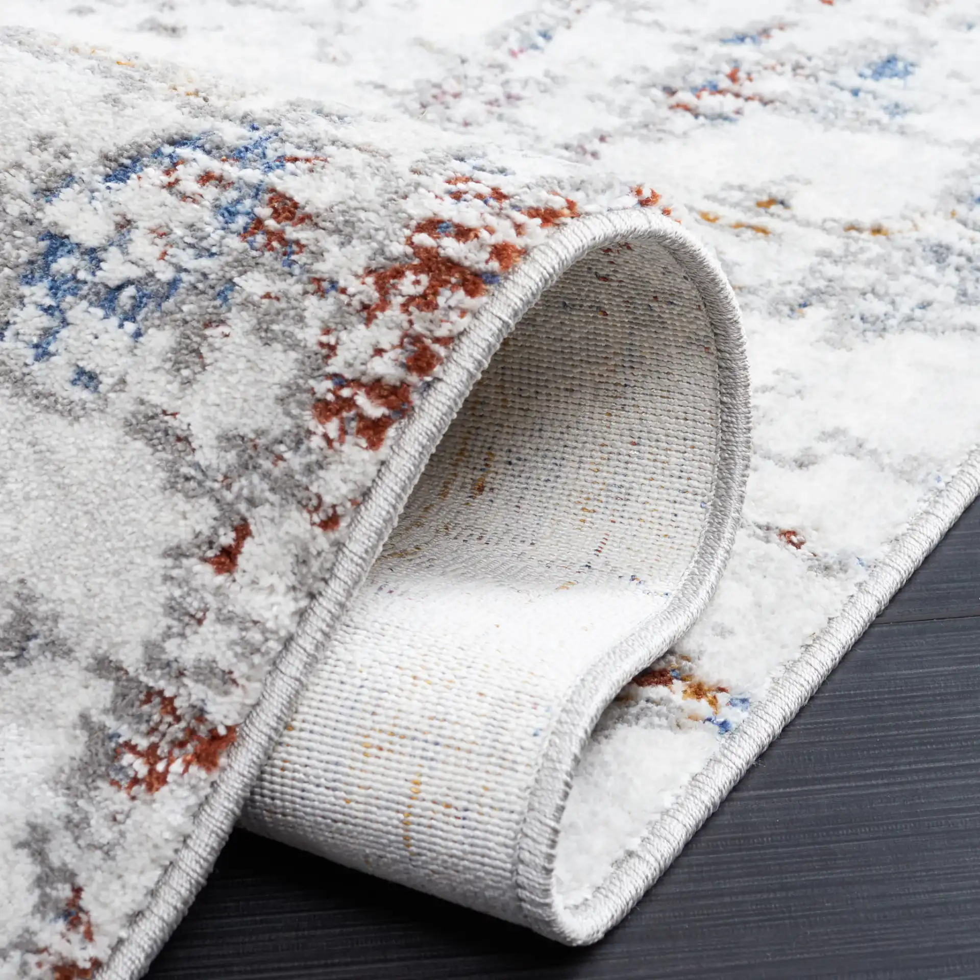 Craft Distressed Abstract Rug in Gray / Gold in a styled room