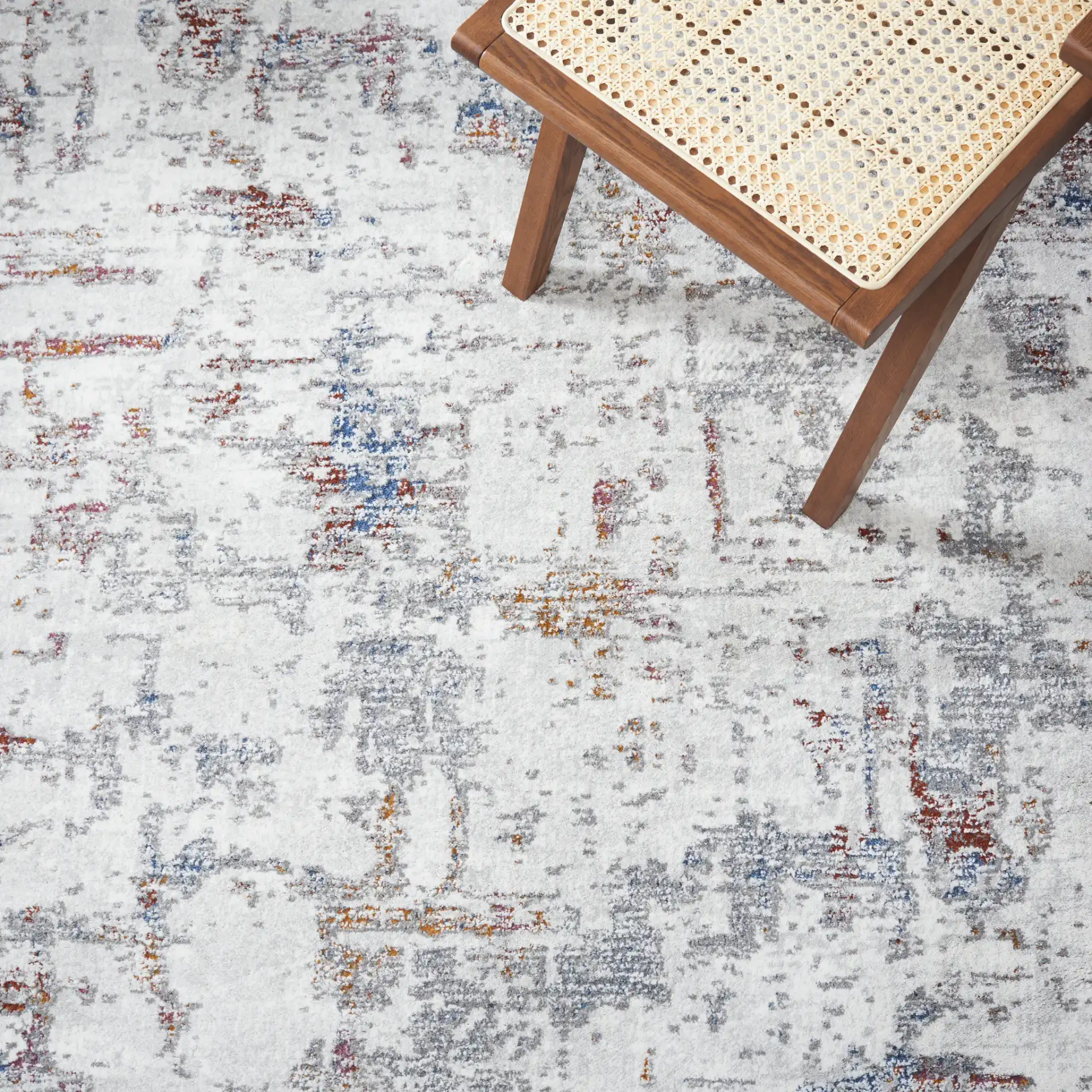 Craft Distressed Abstract Rug in Gray / Gold in a styled room