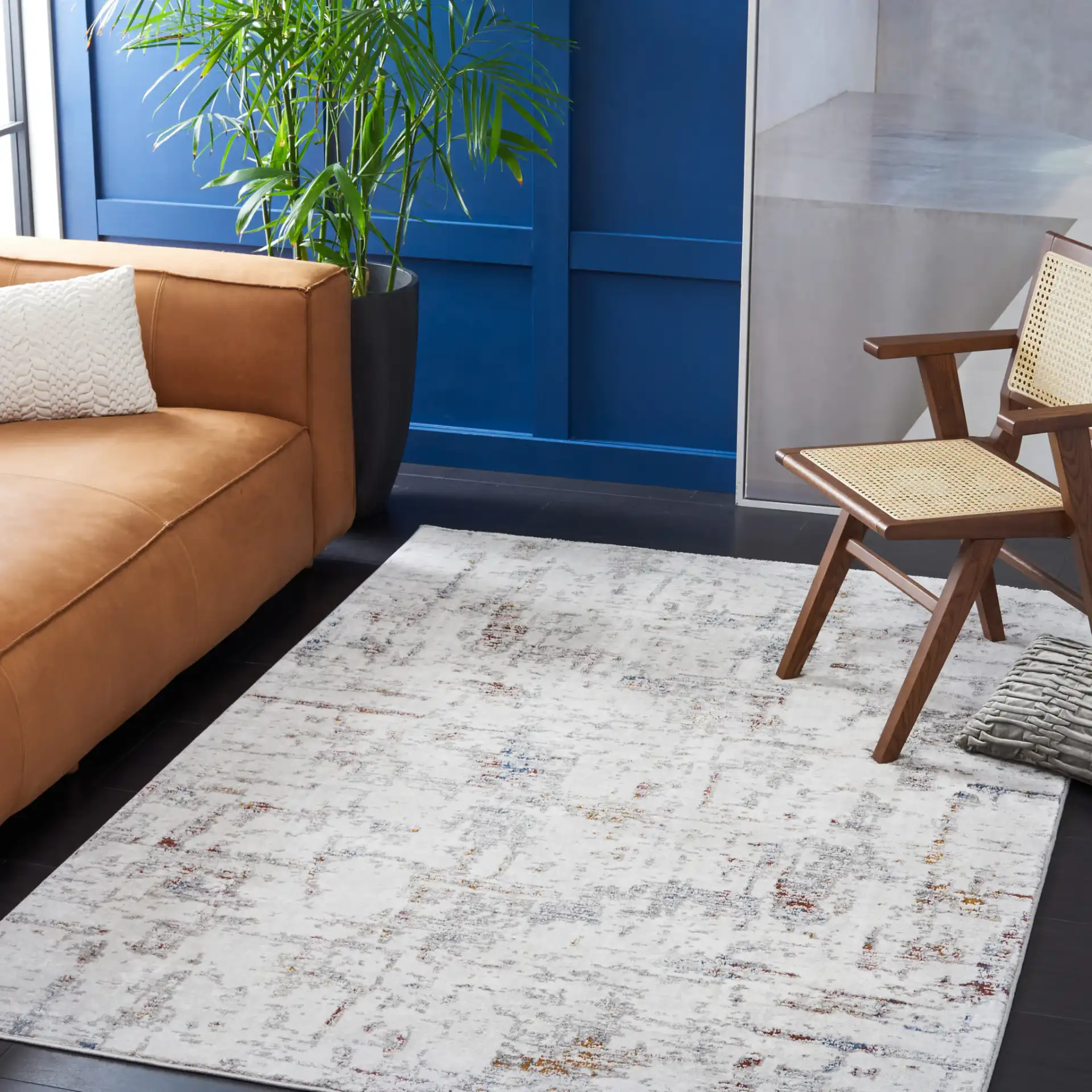 Craft Distressed Abstract Rug in Gray / Gold in a styled room