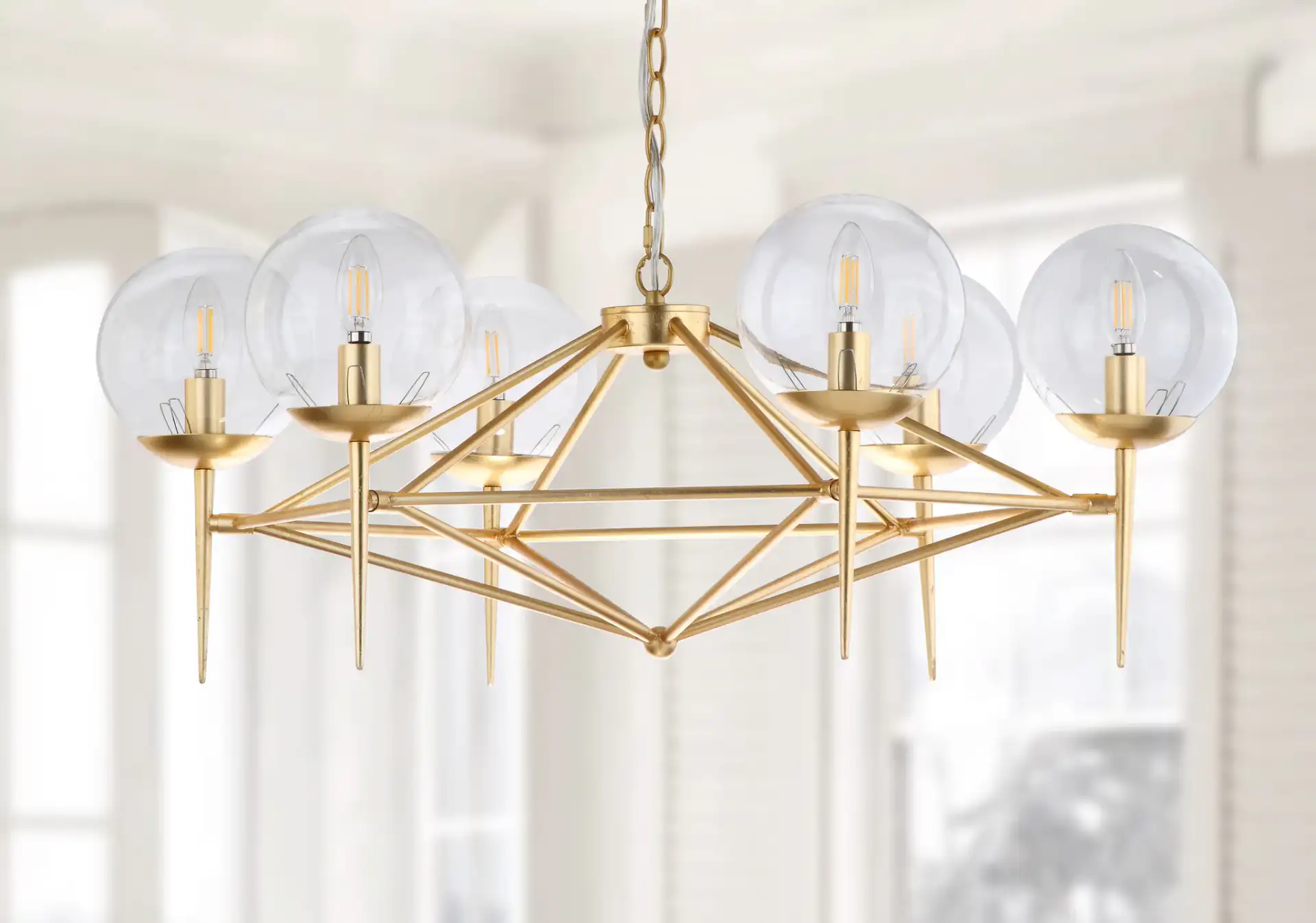 Greyor Six-Light Chandelier in Gold in a styled room