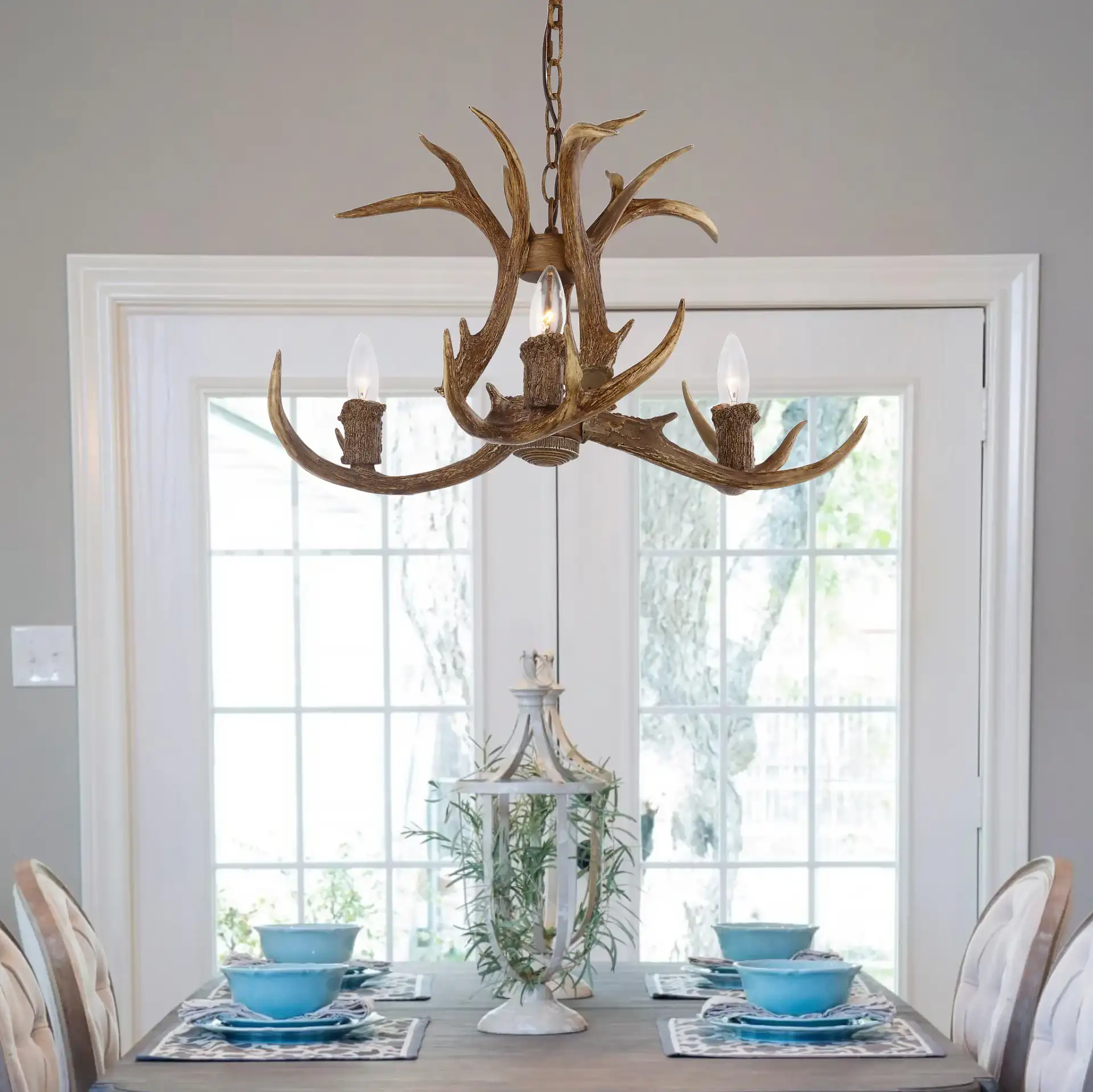 Makani Three-Light Chandelier in Brown in a styled room