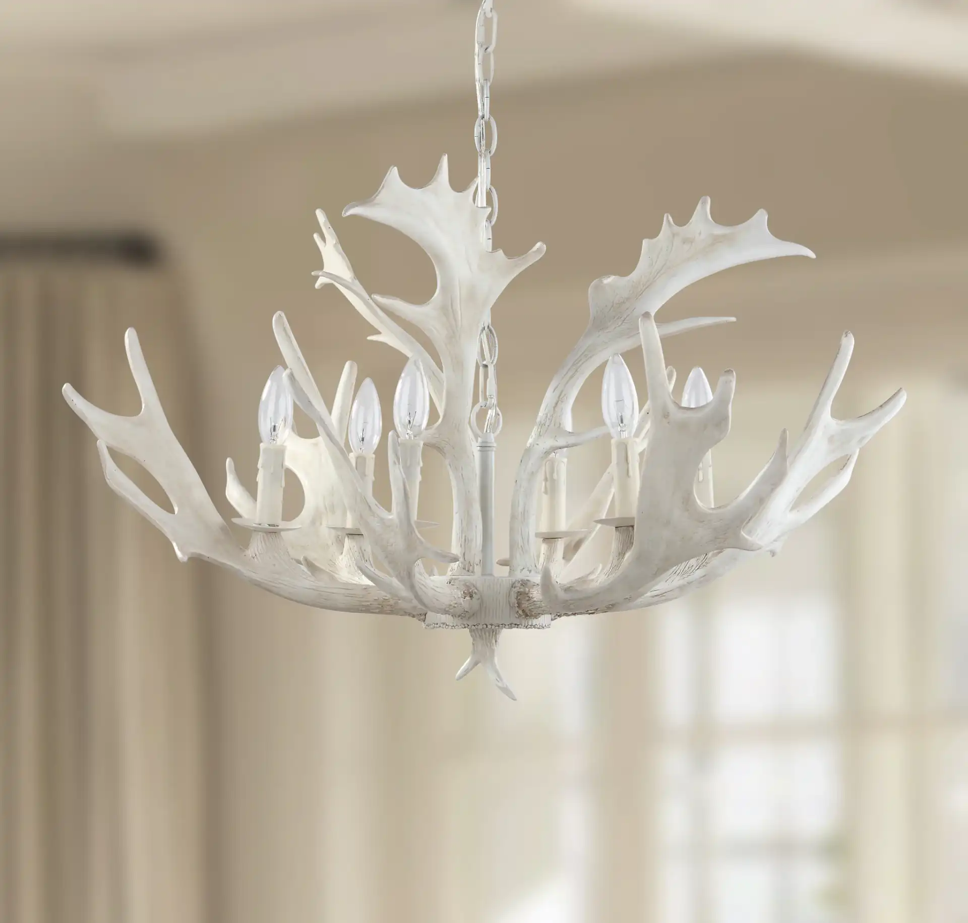 Birch Six-Light Chandelier in White in a styled room