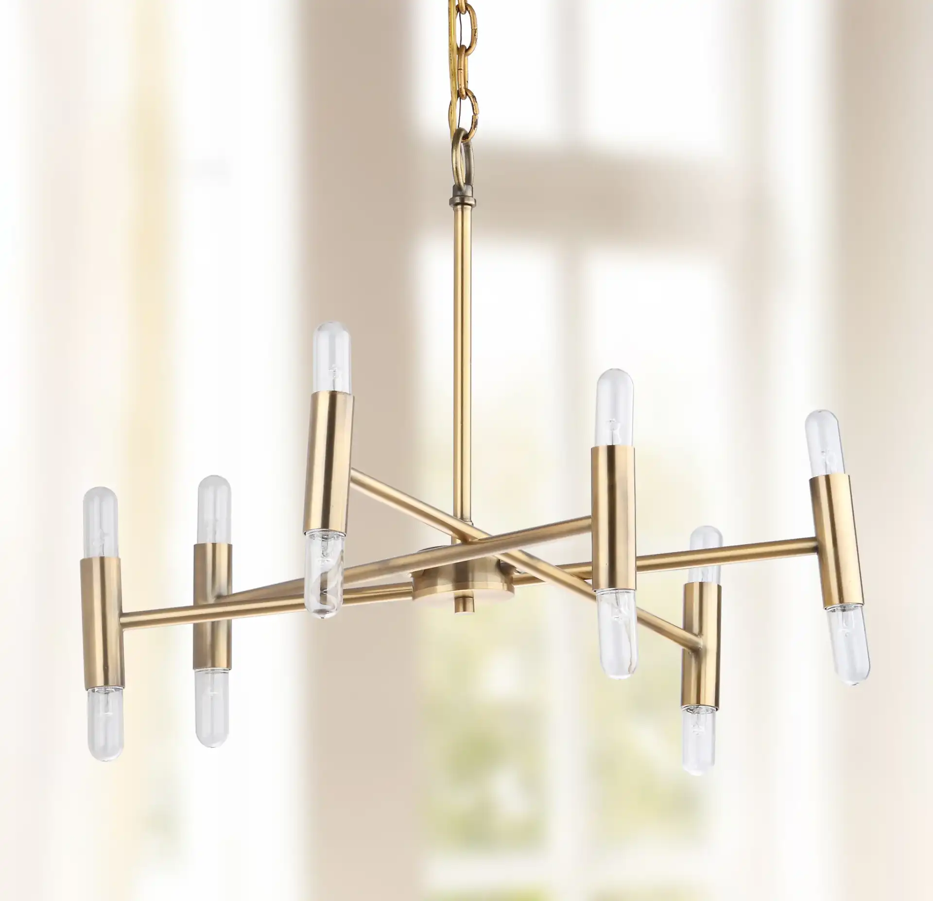 Gale Twelve-Light Chandelier in Gold in a styled room