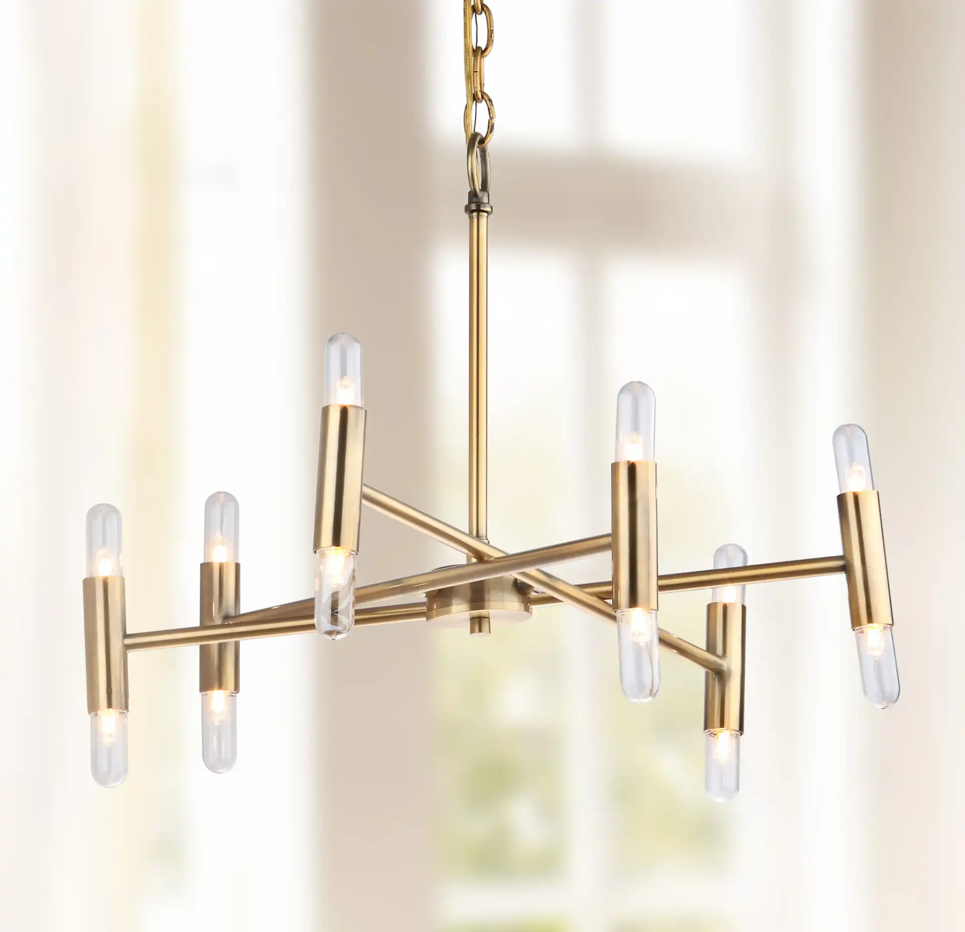 Gale Twelve-Light Chandelier in Gold in a styled room