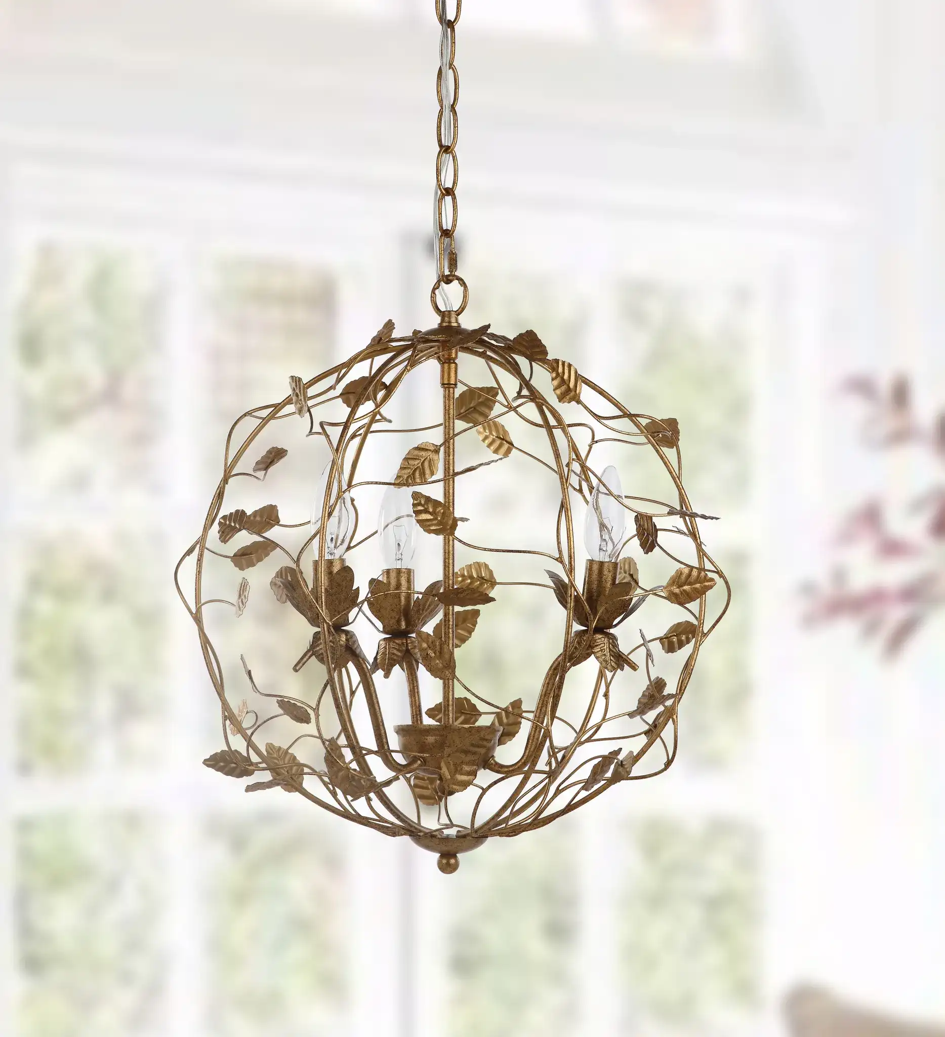 Austen Three-Light Chandelier in Gold in a styled room
