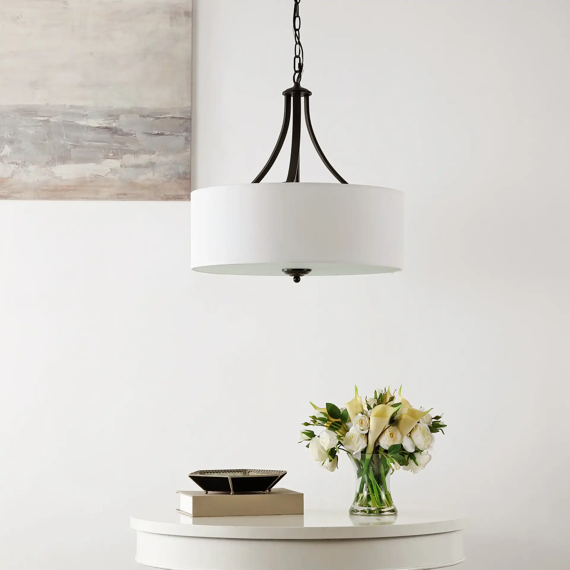 Burnett Three-Light Chandelier in Oil Rub Bronze / White in a styled room
