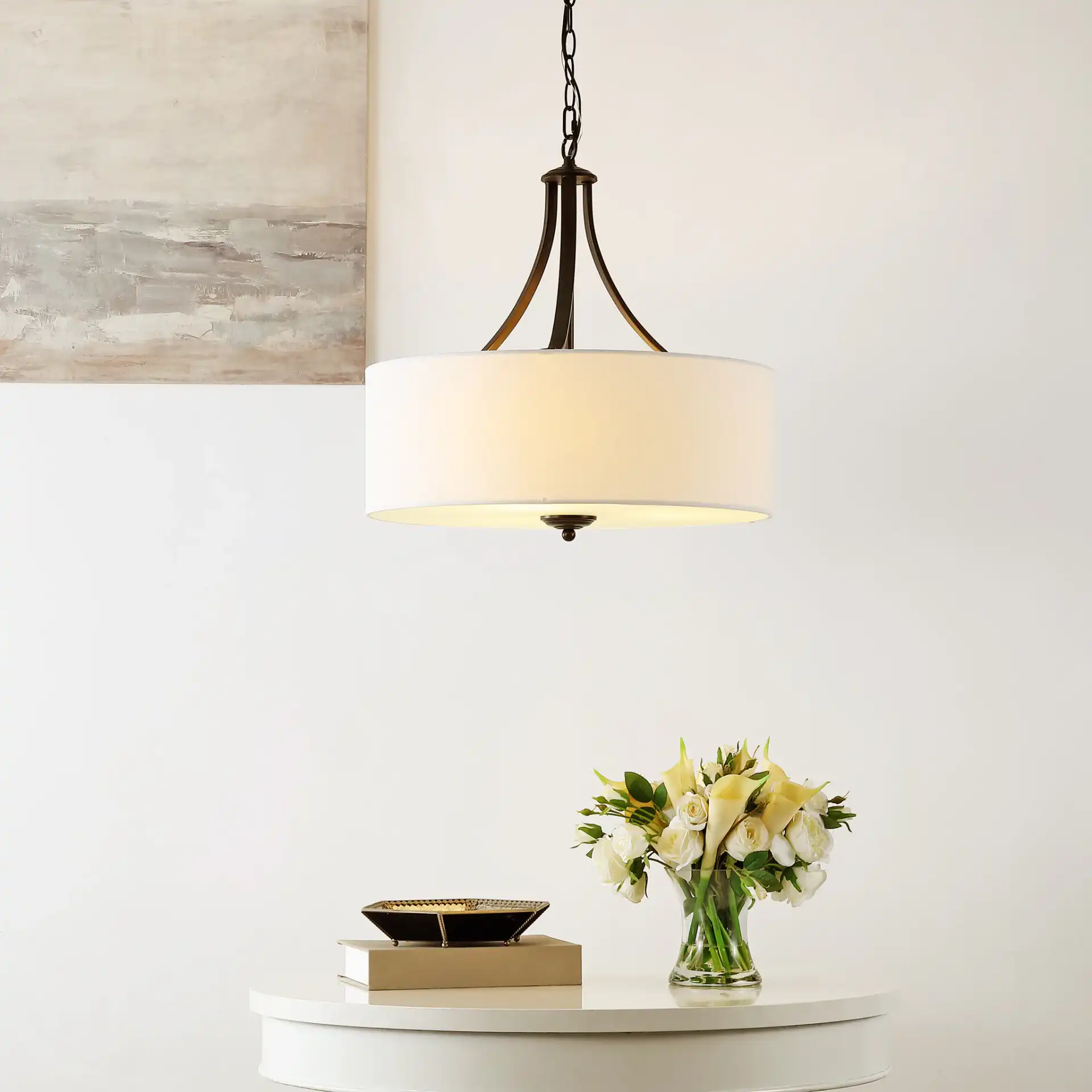 Burnett Three-Light Chandelier in Oil Rub Bronze / White in a styled room