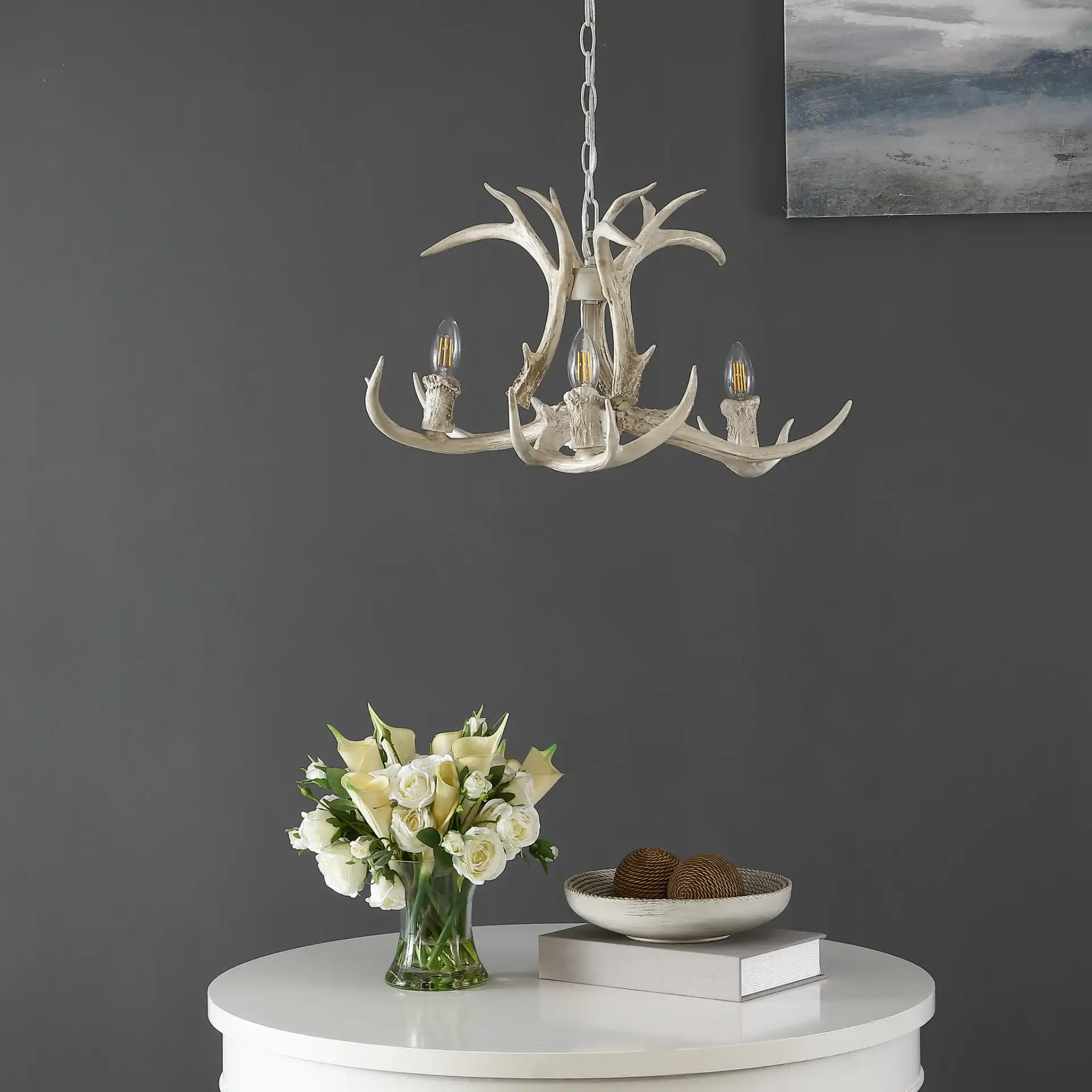 Cenwyn Three-Light Chandelier in Antique White in a styled room