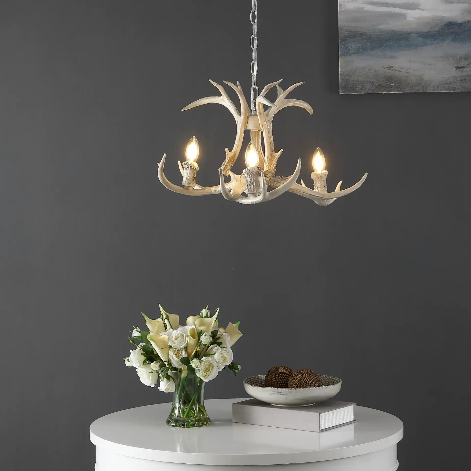 Cenwyn Three-Light Chandelier in Antique White in a styled room