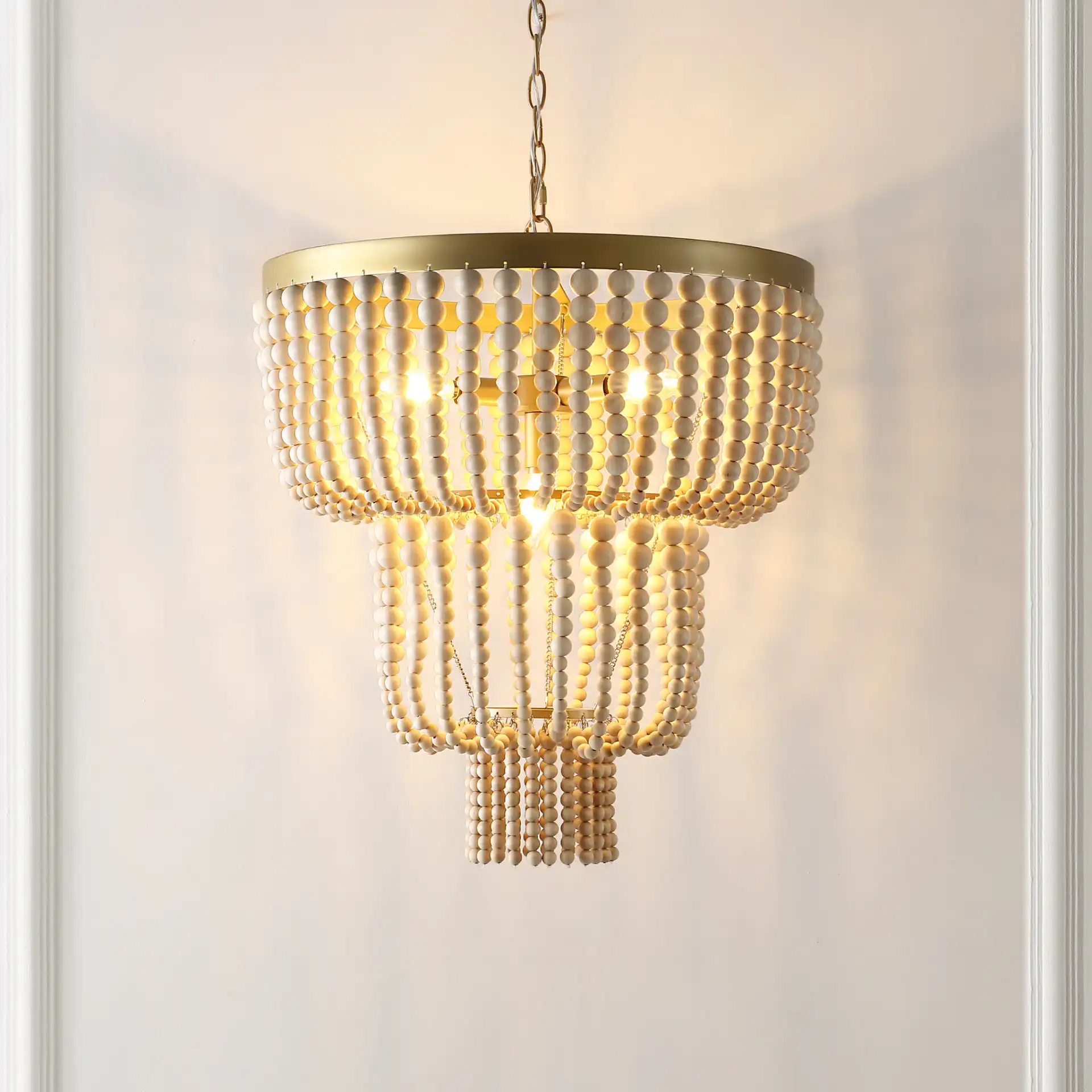 Aleynne Four-Light Chandelier in Brass in a styled room