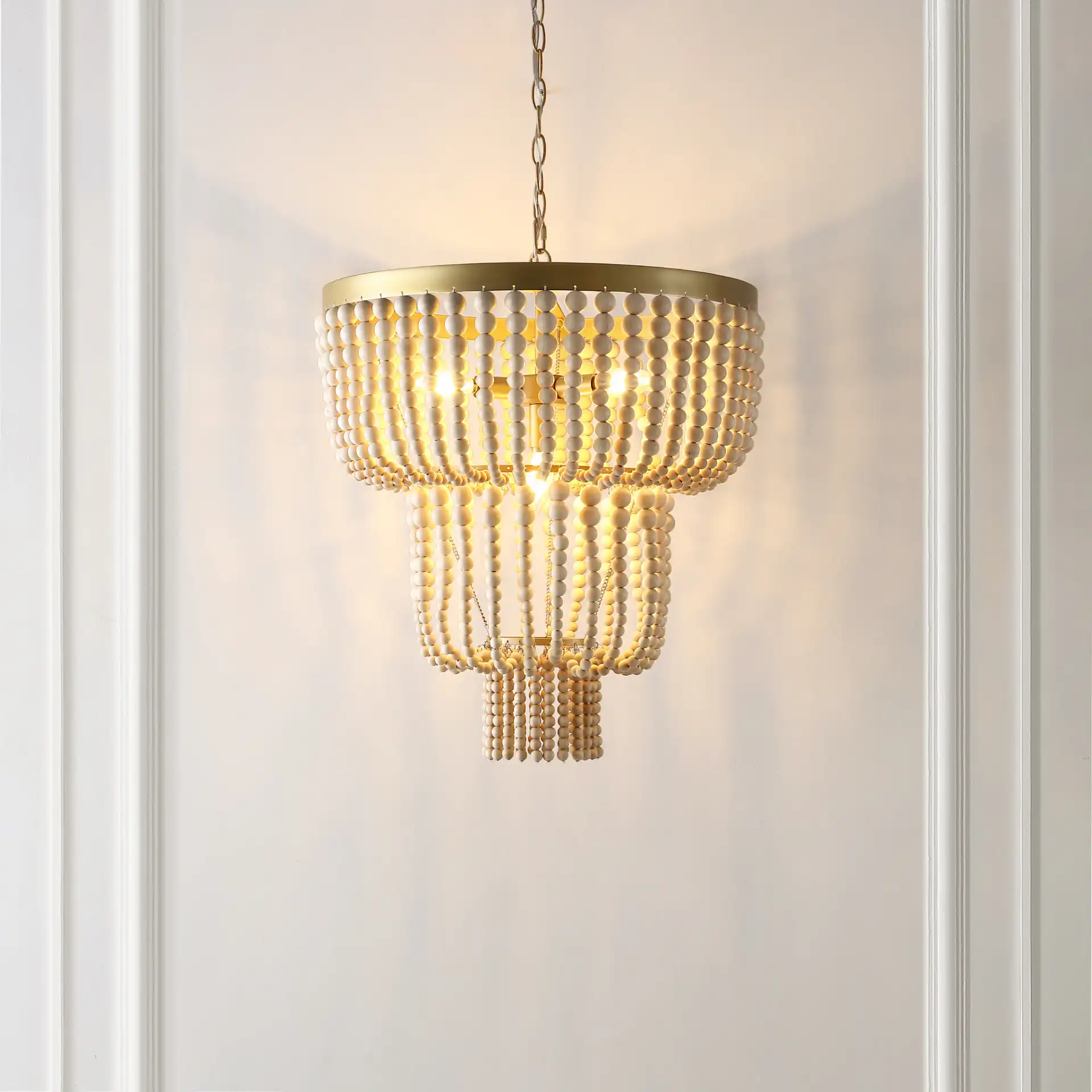 Aleynne Four-Light Chandelier in Brass in a styled room